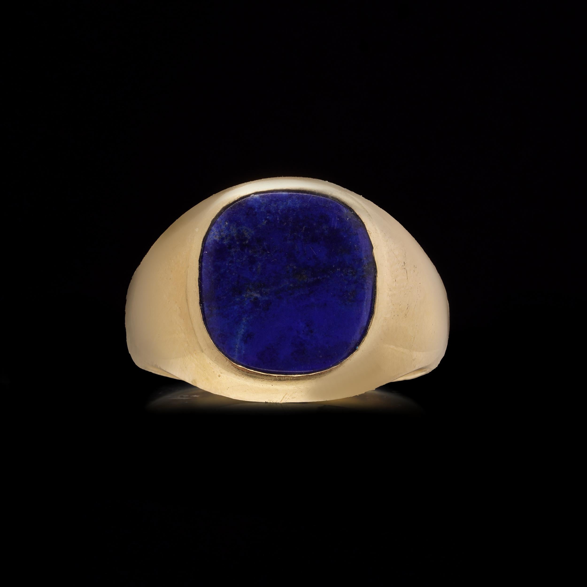 A bold and elegant signet ring crafted in rich 18kt yellow gold, set with a striking lapis lazuli panel. 

Specifications:
Metal: 18kt Yellow Gold
Gemstone: Lapis Lazuli (plain polished cabochon)
Weight: 18.04 grams

Finger Size: X (UK)