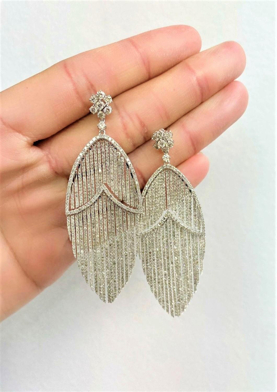 The Following Items we are offering is a Rare Important Radiant 18KT Gold Glamorous and Elaborate Rare Magnificent Glittering Diamond Fringe Design Earrings. Earrings feature OVER 14,000 RARE HANDSET SPARKLING DIAMONDS set in 18KT GOLD! T.C.W.