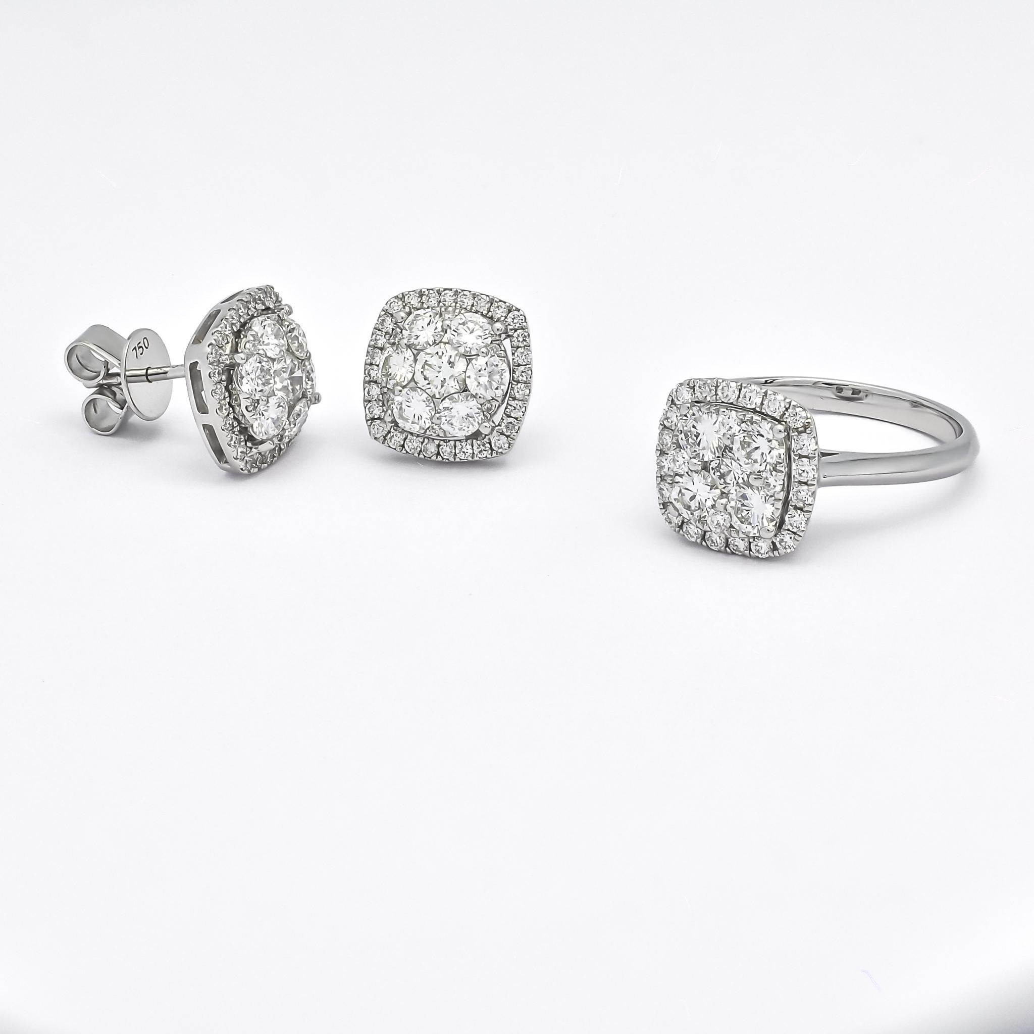 The earrings themselves are a testament to timeless elegance. Crafted with meticulous attention to detail, they feature a delicate, yet captivating design that accentuates the inherent brilliance of each diamond. 

The central round-cut diamonds,