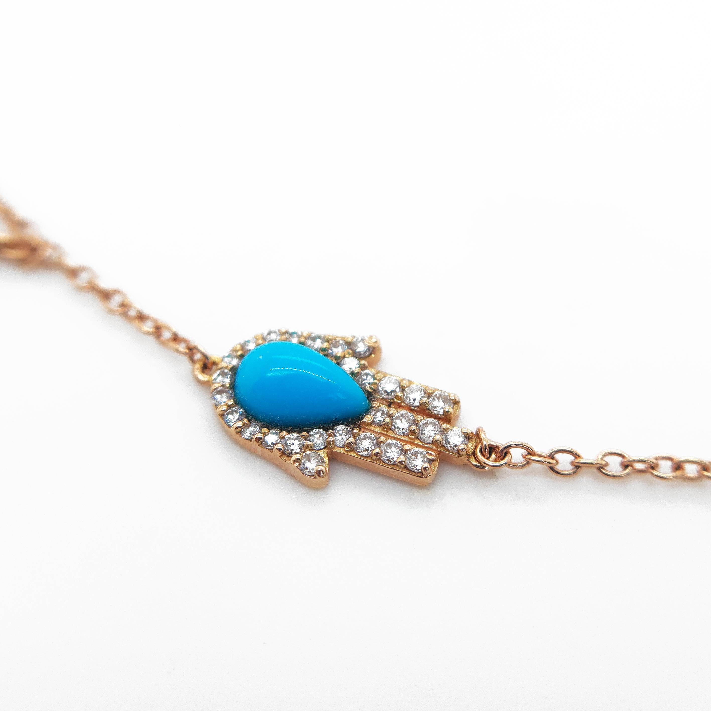 Contemporary 18kt gold necklace with diamond & turquoise hand and dangling rose-cut diamonds For Sale