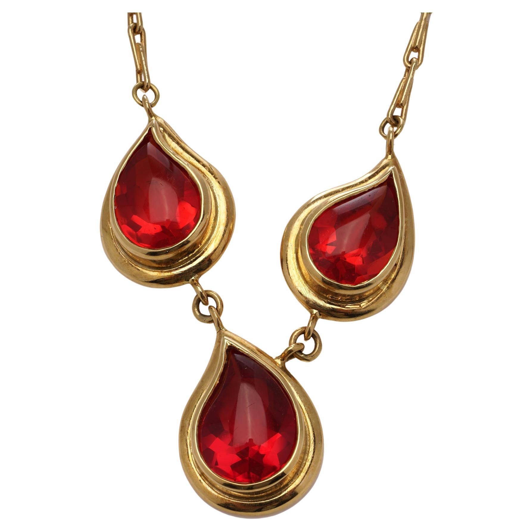 18kt gold pendant necklace featuring three tear-drop-shaped fire opals For Sale
