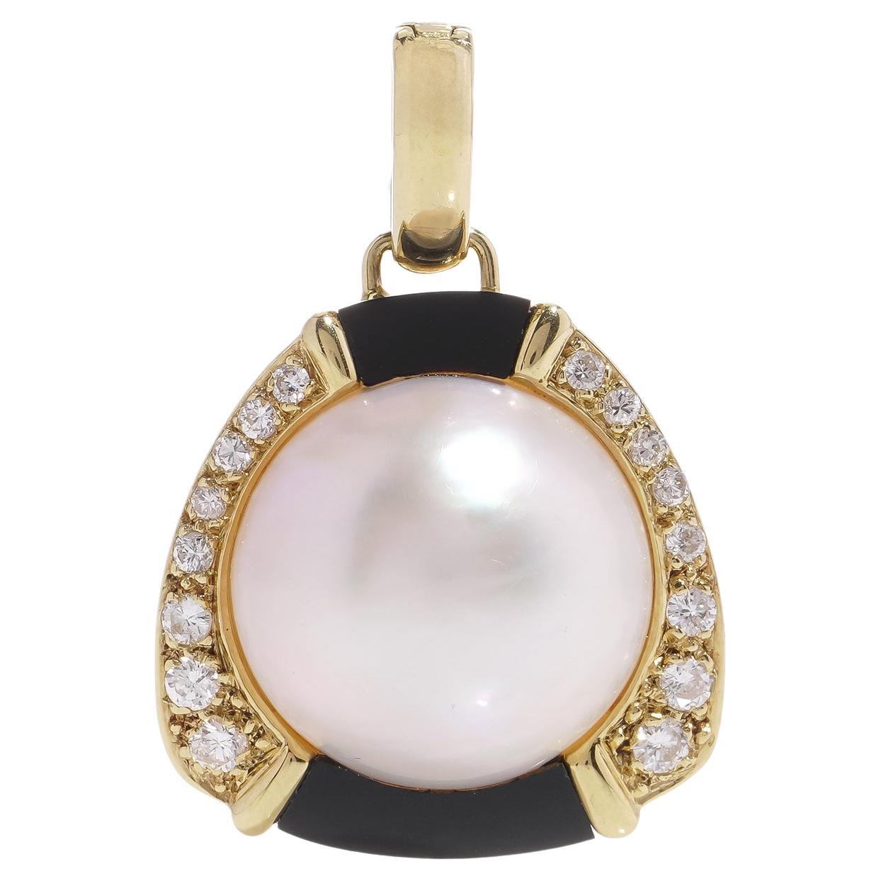 18kt gold pendant with half of Akoya pearl, onyx, and 0.50 cts. of diamonds  For Sale