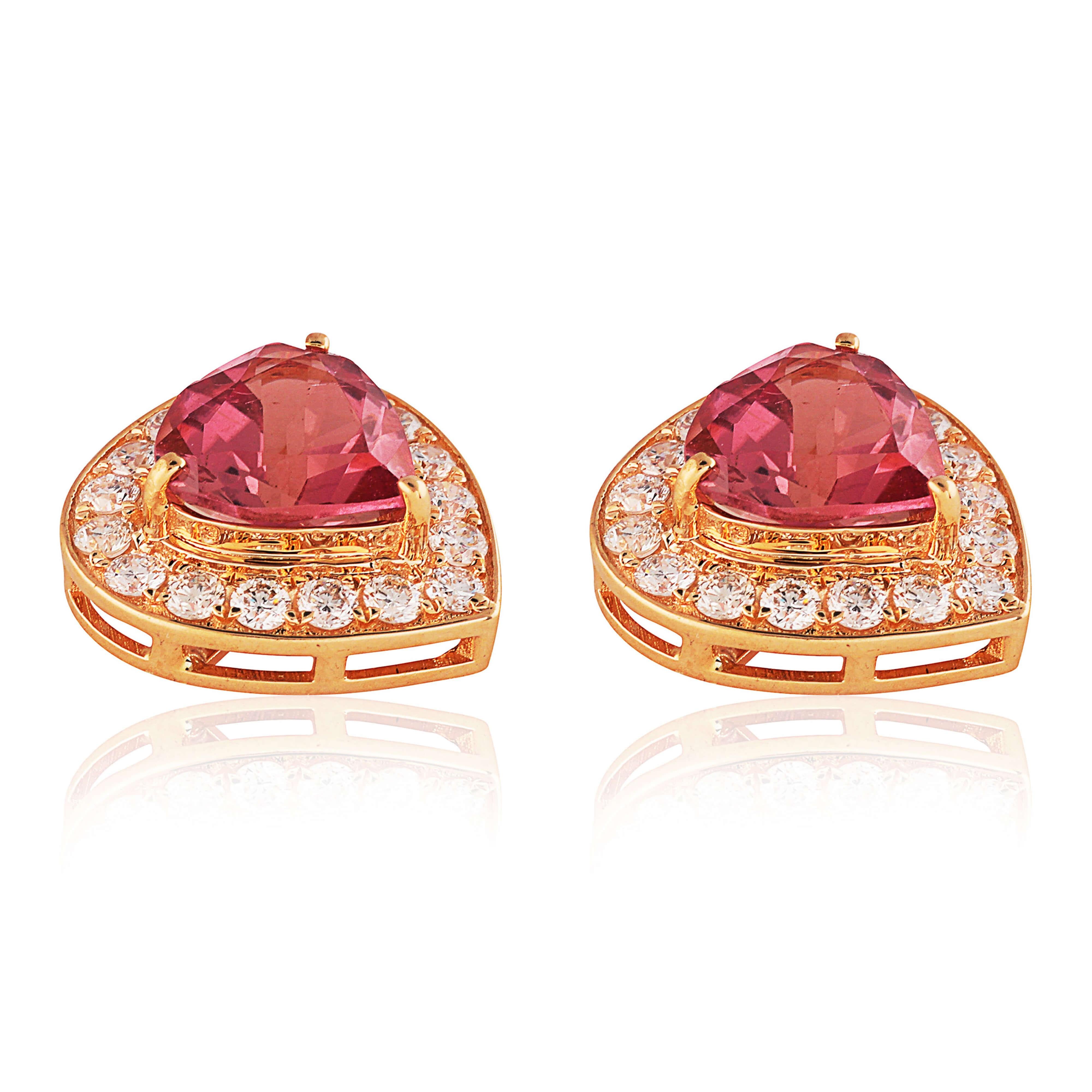 A forever piece of jewellery. A classic, an heirloom. A great (‘can’t go wrong) gift!

Set on 18kt gold with consciously sourced round cut brilliant diamonds and high pink tourmalines.

3.516 grams 18kt gold; 0.53 carat round brilliant cut diamonds;