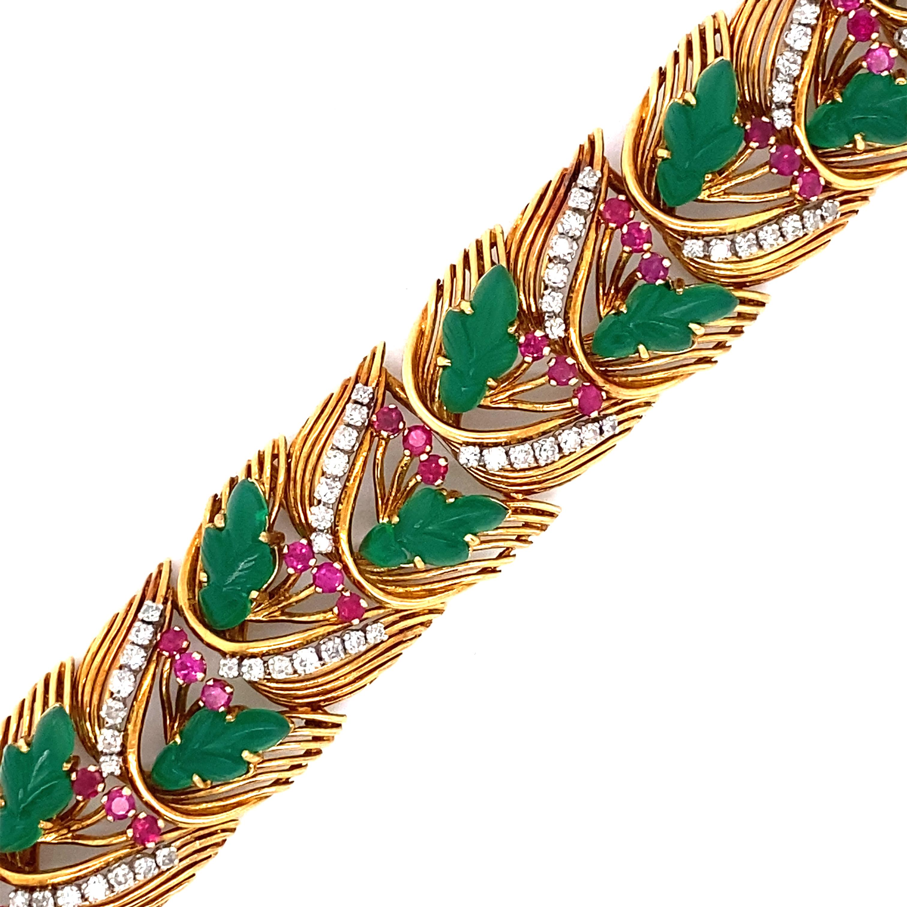 18 kt carved green onyx leaves, 98 old-mine and single-cut diamonds ap. 2.70 cts., 42 round rubies, with French assay marks, approximately. 44.8 dwts. Length 7 3/8 inches.