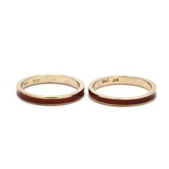 Pair of 18K Yellow Gold and Red Enamel Bands