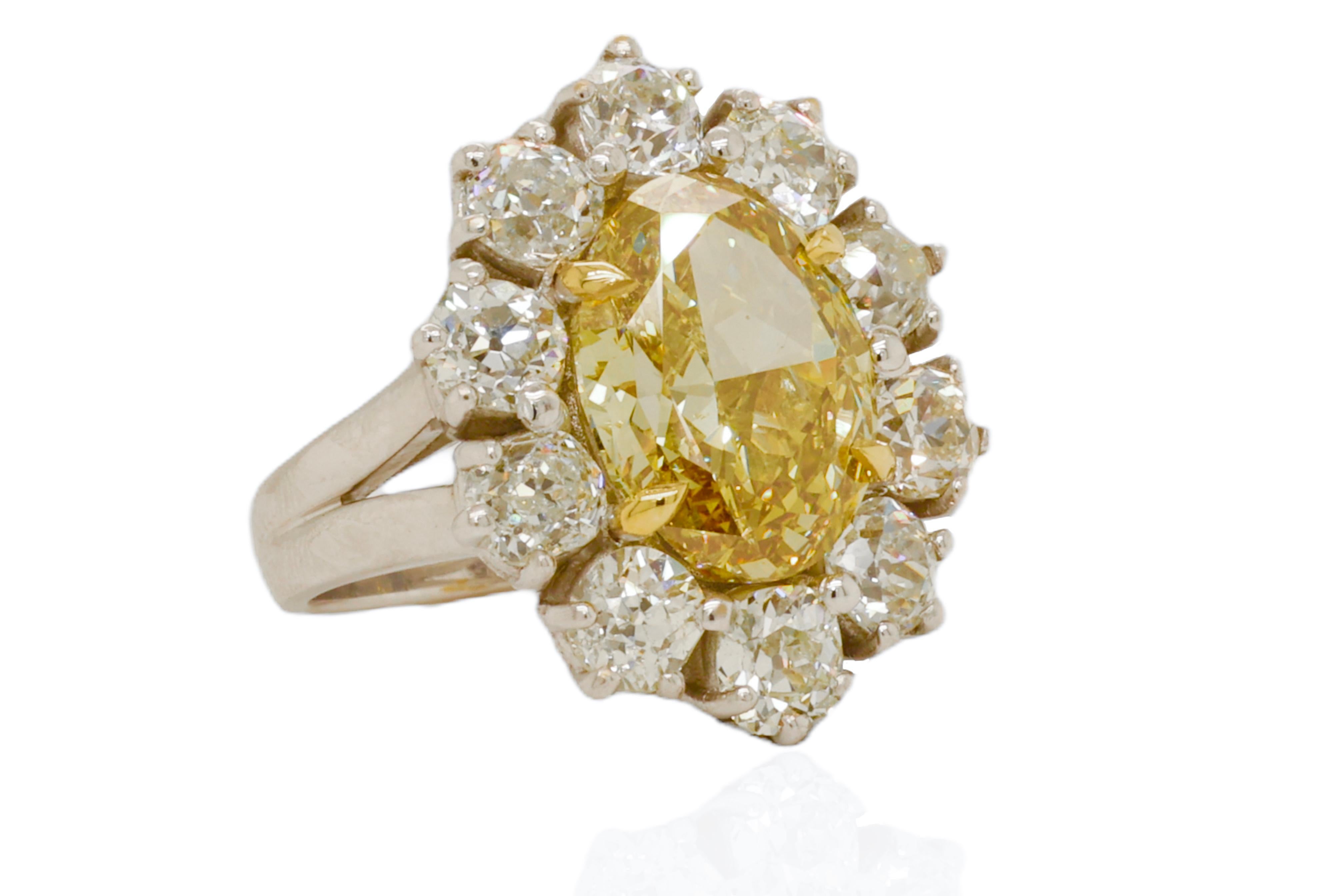 18kt Gold Ring 7.17ct Natural Fancy Yellow Oval Diamond & 4.5ct White Diamonds For Sale 2