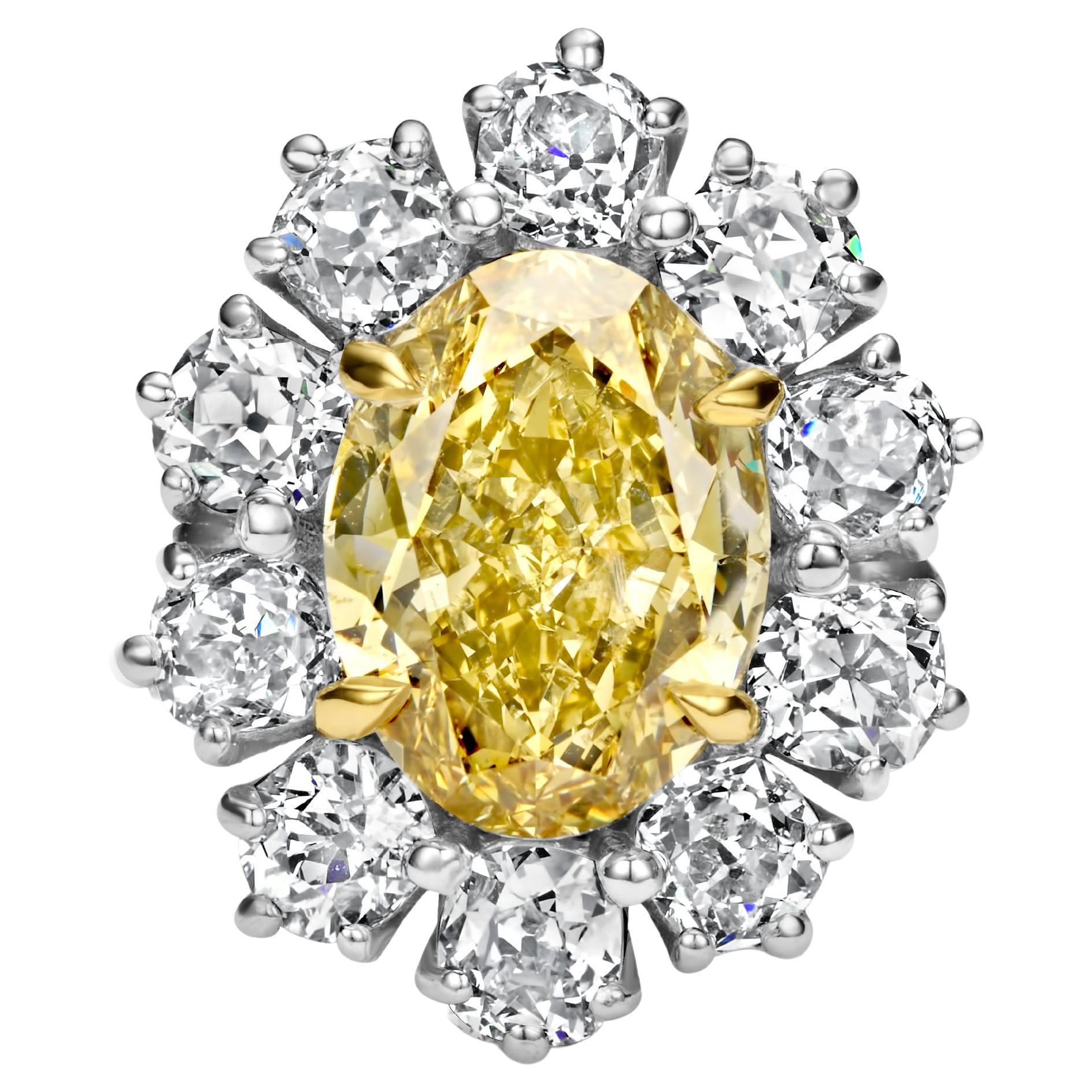 Gorgeous 18kt White Gold Ring With 7.17ct. Natural Fancy Yellow Diamond and 4.9ct White Diamonds

Yellow diamond: Oval modified brilliant, Natural Fancy deep brownish Yellow diamond, 7.17 ct. Comes with GIA Certificate 5202894197 

Diamonds: Old