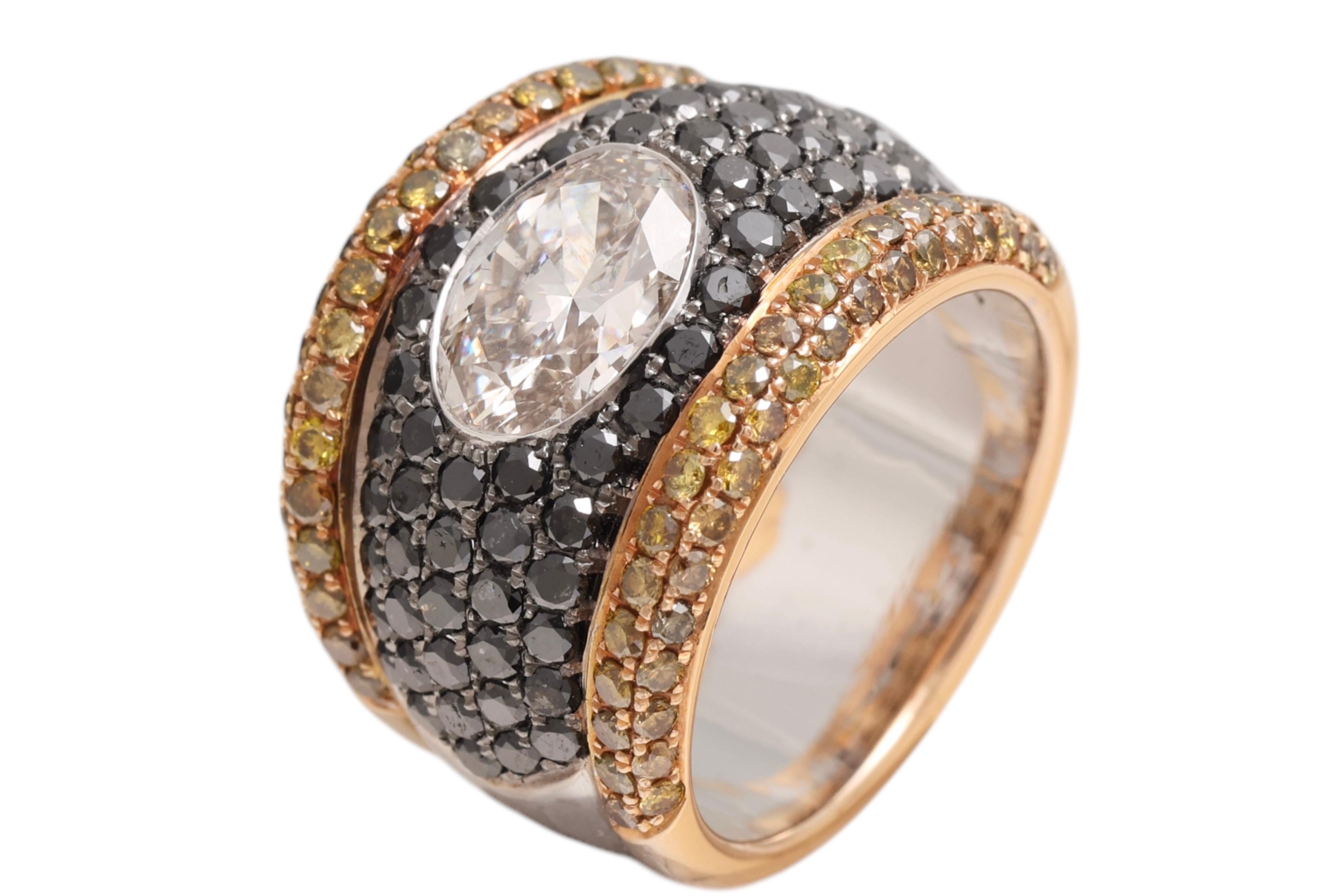 18Kt solid white and pink Gold HandMade Unique Ring With Black & Fancy Cognac Diamonds, 2.31 Ct Large Oval Cut Center diamond 

Diamonds: black and fancy Cognac diamonds, oval diamond cut 2.31 Cts ( IGI Preliminary certificate K SI1 )
Black Diamonds