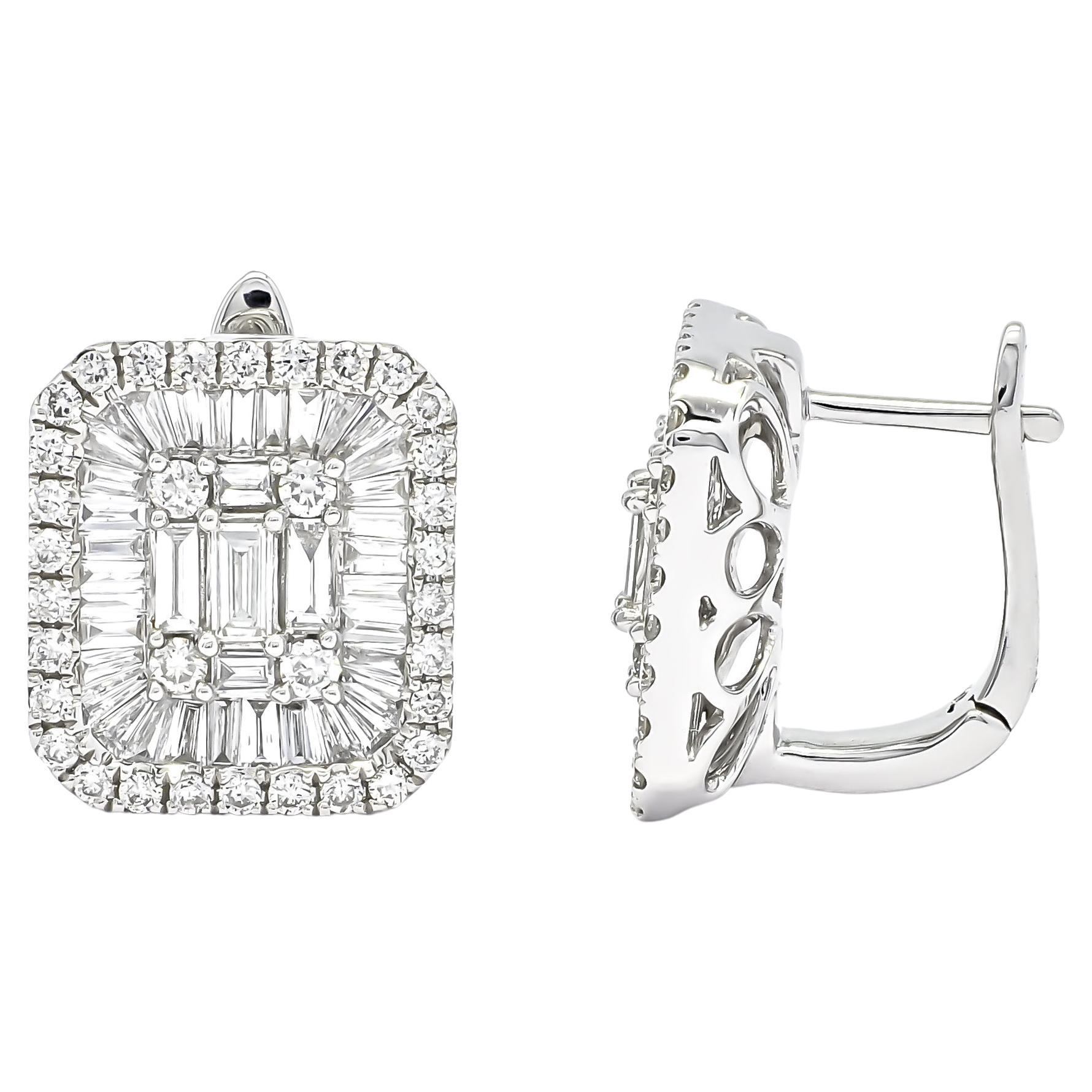 Exquisite and spectacular, round and baguette-cut diamonds come together with over-the-top sparkle on these bold Illusion Huggie stud earrings. 

Stunning baguette-cut stones combine with gorgeous round stones to create an intricate and fascinating