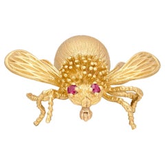 Broche de oro de 18 quilates y rubí de Tiffany & Co.
