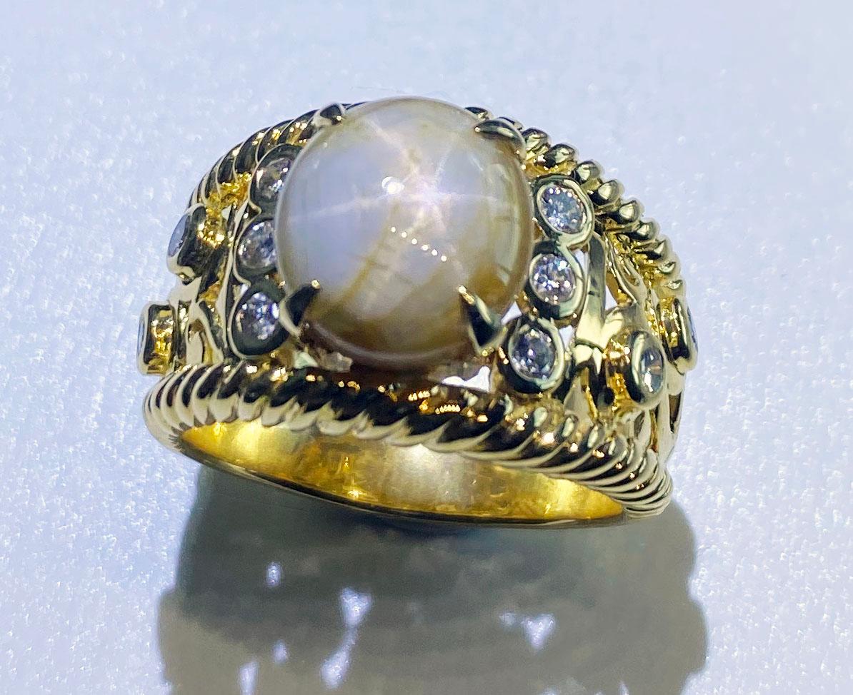Classical Roman A Star Sapphire & Diamond Ring set in 18kt Yellow Gold  For Sale