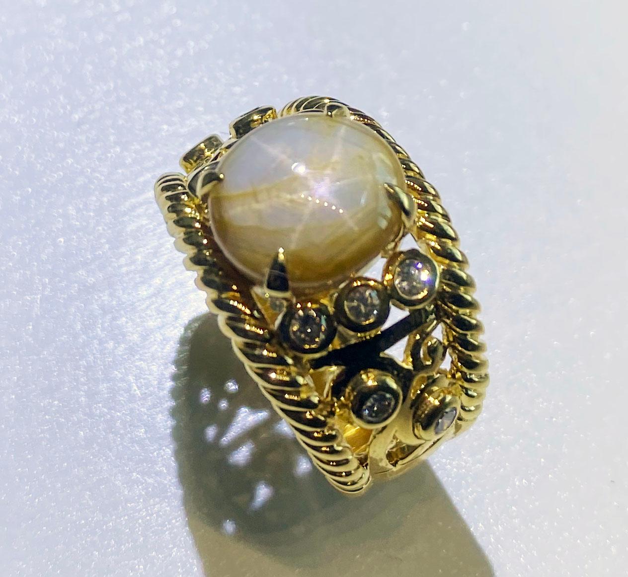 Cabochon A Star Sapphire & Diamond Ring set in 18kt Yellow Gold  For Sale