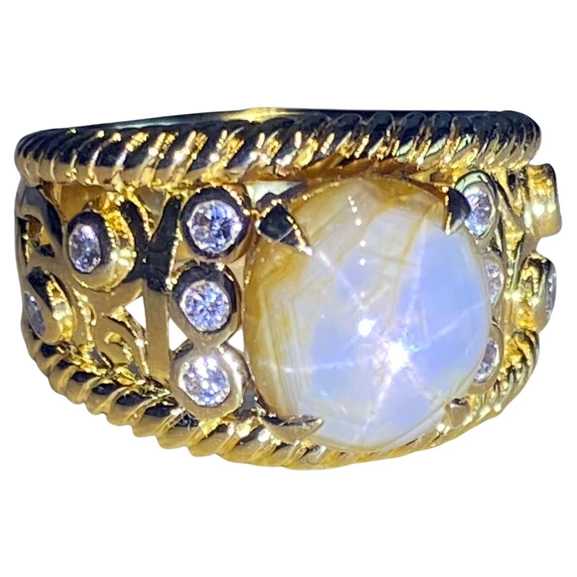 A Star Sapphire & Diamond Ring set in 18kt Yellow Gold  For Sale