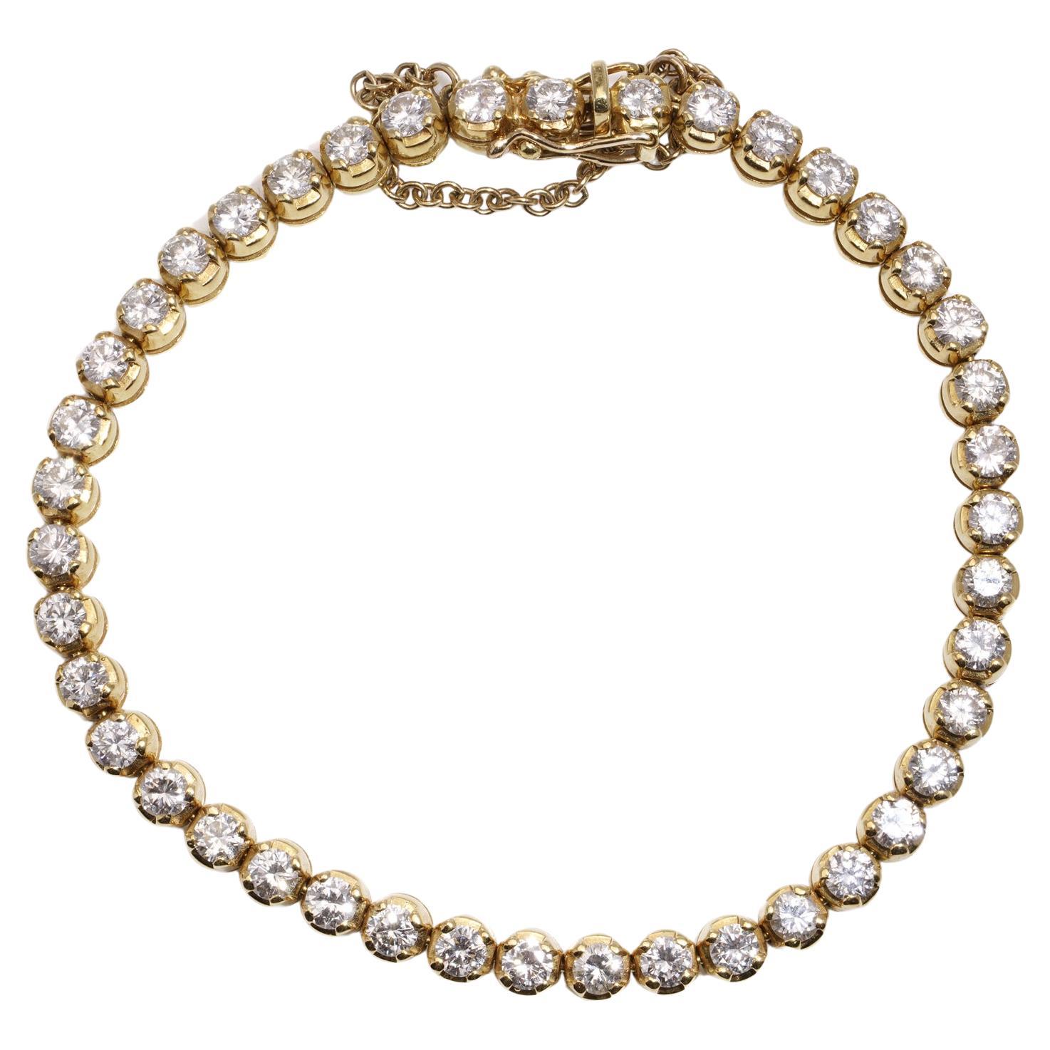 18kt gold tennis bracelet set with 6.30 carats of round brilliant diamonds  For Sale