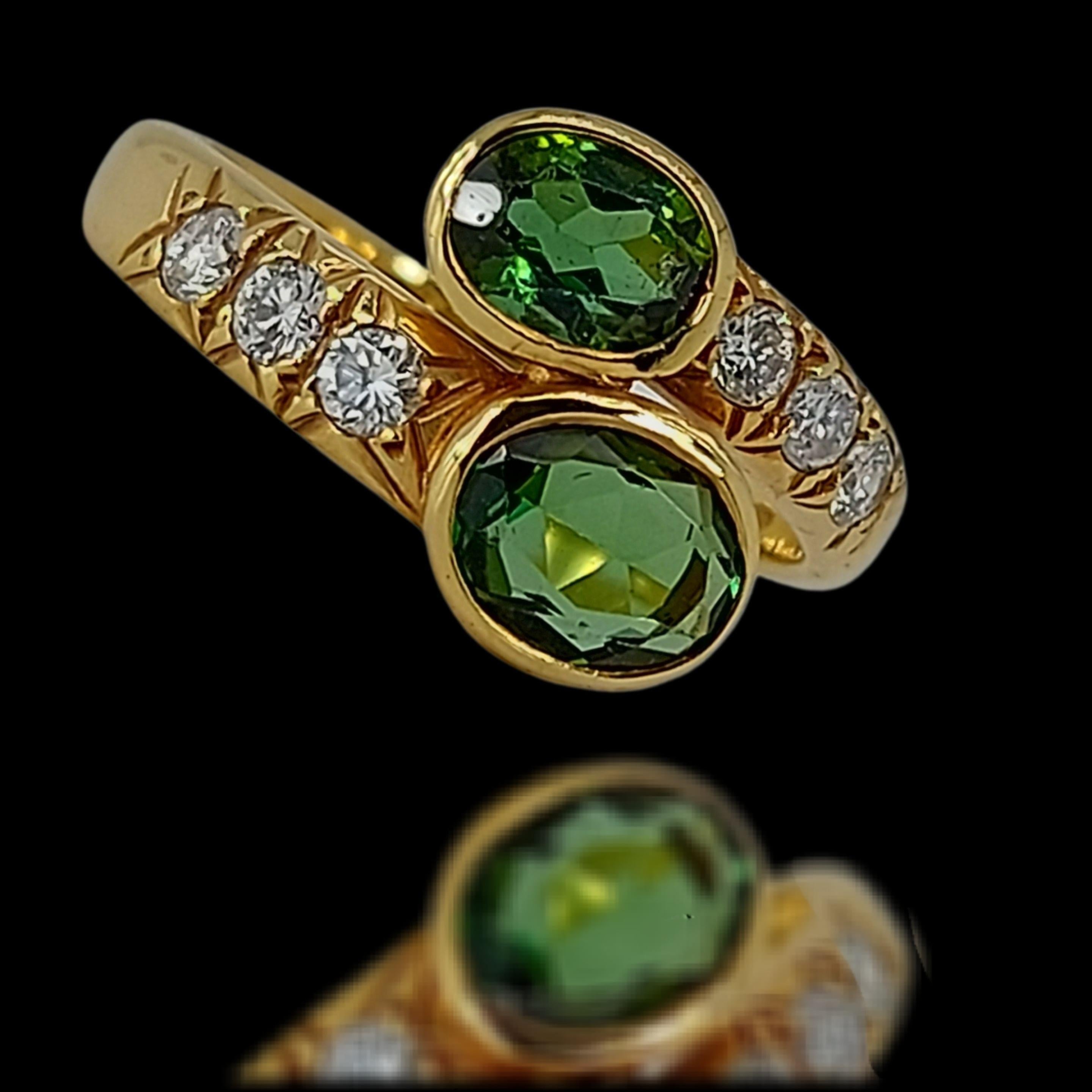 Gorgeous 18kt Gold Toi Et Moi Ring with 0.5ct Diamonds and 2.3ct Tourmaline

Diamonds: 6 brilliant cut diamonds together 0.5ct

Tourmaline: 2 green tourmaline together approx. 2.3ct

Material: 18 kt yellow gold

Ring size: 62 EU / 10 US ( can be