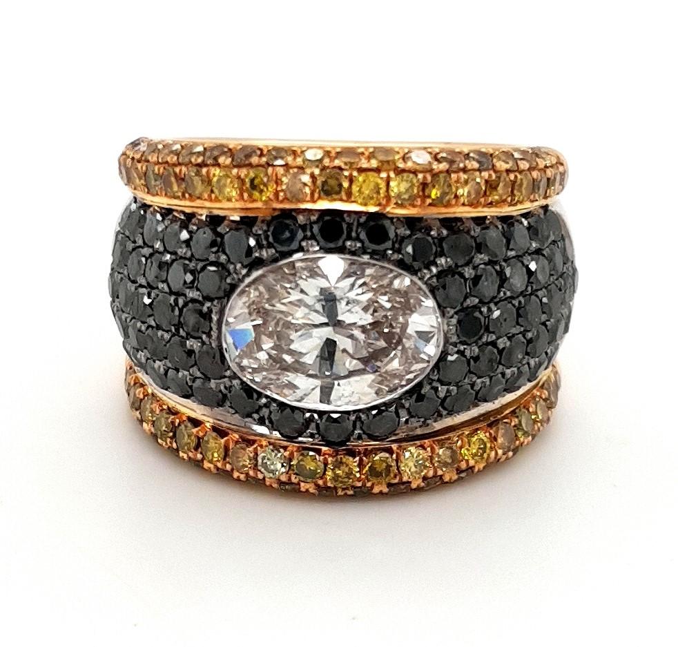18Kt solid white and pink Gold HandMade Unique Ring With Black & Fancy Cognac Diamonds, 2.31 Ct Large Oval Cut Center diamond 

Diamonds: black and fancy Cognac diamonds, oval diamond cut 2.31 Cts ( IGI Preliminary certificate K SI1 )
Black Diamonds