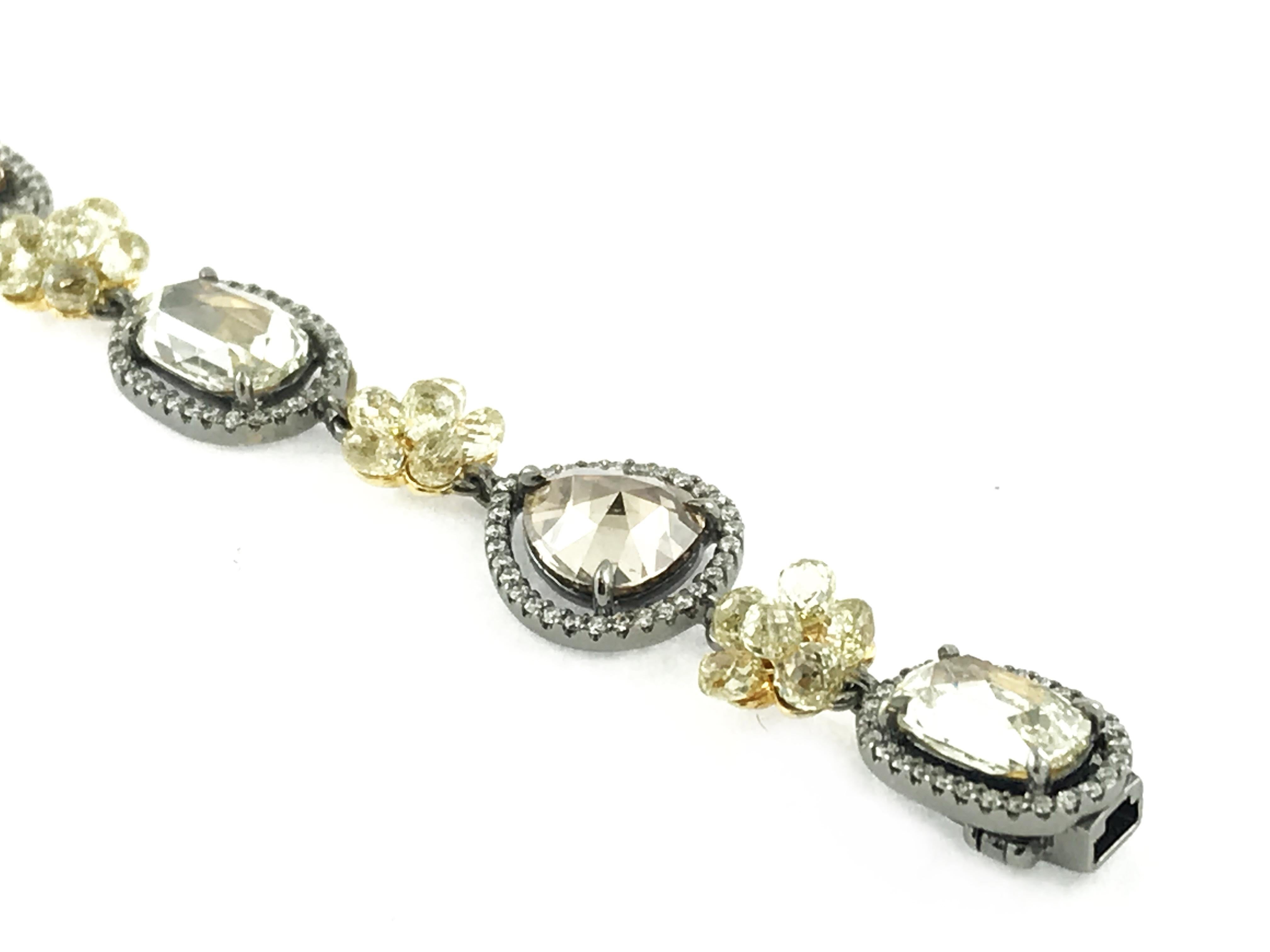 From our award winning COUTURE line. Designed by Samir Bhansali, this one-of a kind bracelet features a beautiful combination of brilliant cut round diamonds (0.77cts), fancy yellow diamonds beads (5.89cts) , yellow rose cut diamonds (2.98cts) and