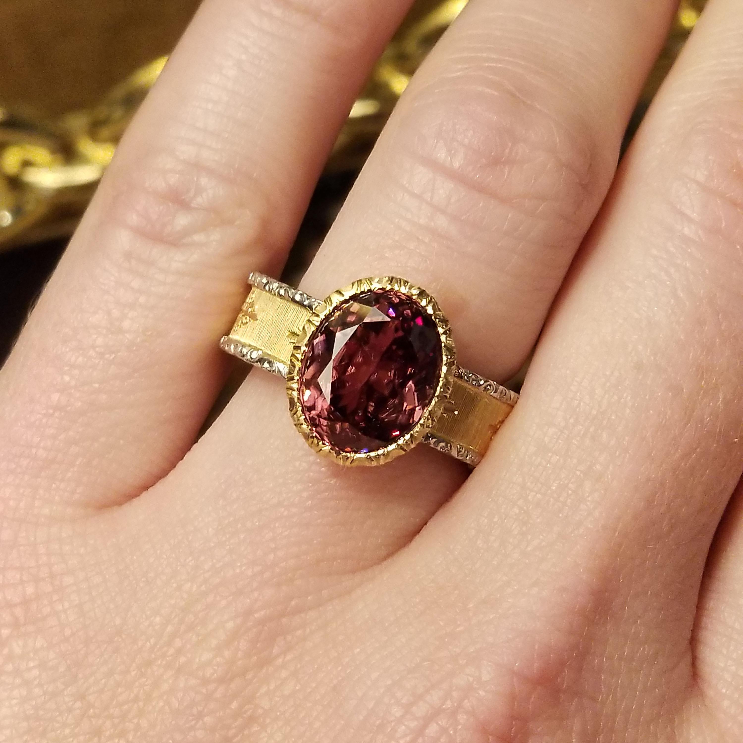 One of my favorite things is the sheer delight that my customers experience at the surprise of how amazing a zircon can look when cut properly. This is a 5.78ct pink zircon, mined in Tanzania, and it is cut to absolute perfection. The clean style of