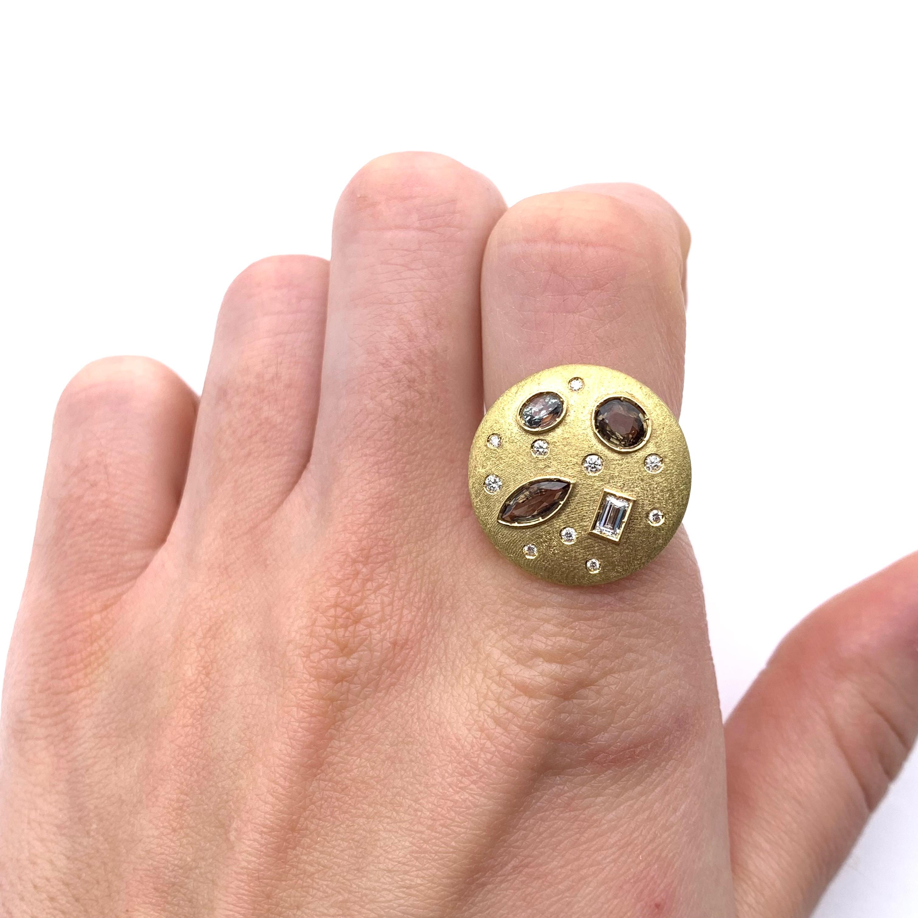 This dazzling ring is a new addition to our Italian collection. The piece was designed by our staff and beautifully executed by a multigenerational goldsmith in Florence, Italy. 
Reminiscent of stars, this ring is flush set with 0.20 carats of