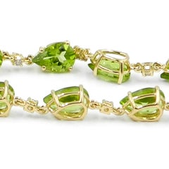 Pendientes Garavelli Oro Amarillo Largo 18 Quilates Peridoto y Diamantes Marrones