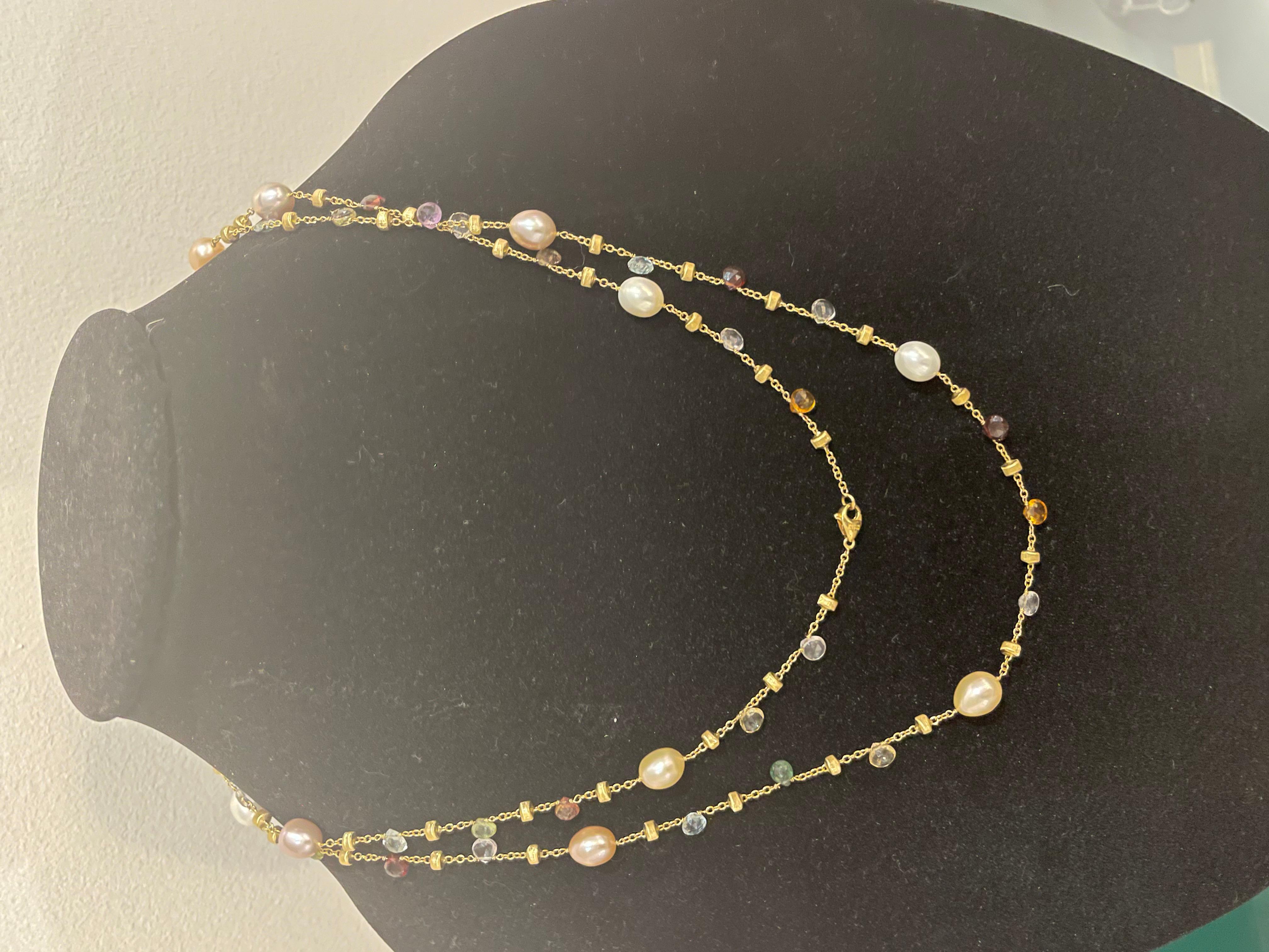 Stunning 18kt yellow gold Marco Bicego paradise necklace featuring pearls, amethyst, garnet, citrine, topaz, tourmalines and lolittes all in beautiful briolette cuts.