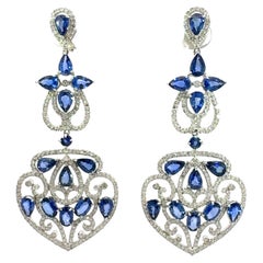 18Kt natural blue sapphire and diamond earrings