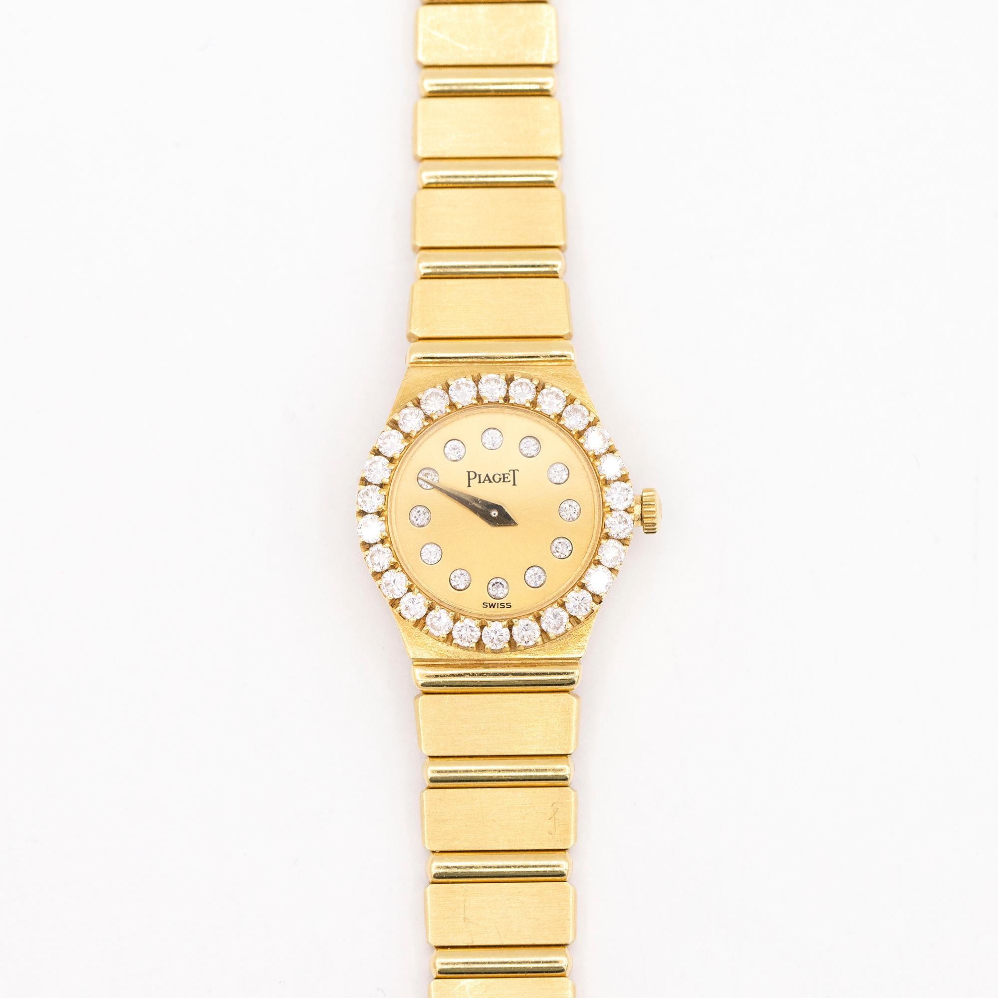 18 karat yellow gold Piaget Polo diamond bezel diamond dial quartz timepiece. The timepiece is a size 21mm with a solid 18 karat yellow gold bracelet. The model number is 846C701. There are 26 round brilliant cut diamonds on the bezel weighing .78
