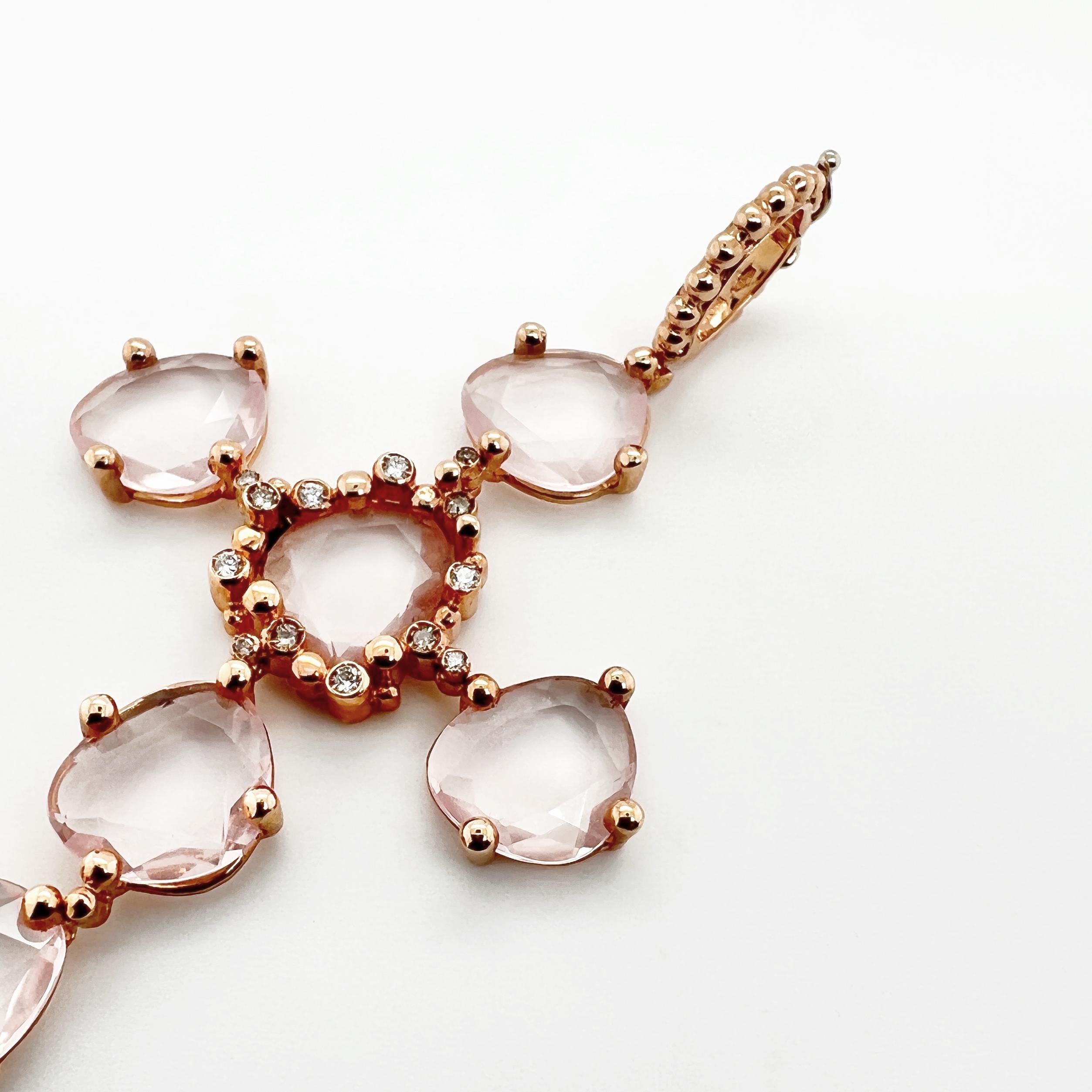 All of our jewellery is made by Italian Artisans to guarantee the Made In Italy manufacturing. 

The 18kt Pink Gold Cross pendant with Pink Quartz and Natural Diamonds is a meaningful piece of jewelry. Pink gold has a warm and feminine hue that adds