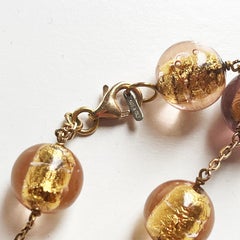 Halskette aus 18 Kt. Roségold mit Murano-Perlen und Herzanhängern