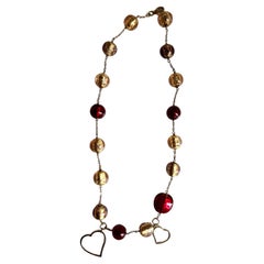 Collier en or rose 18 carats avec perles de Murano et pendentifs en forme de cœur