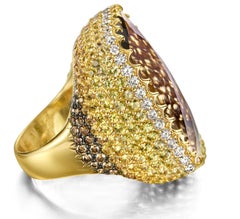 18kt Pink Gold Ring with a Large 36.5ct Topaz, 7.49ct Yellow Sapphires, Diamonds
