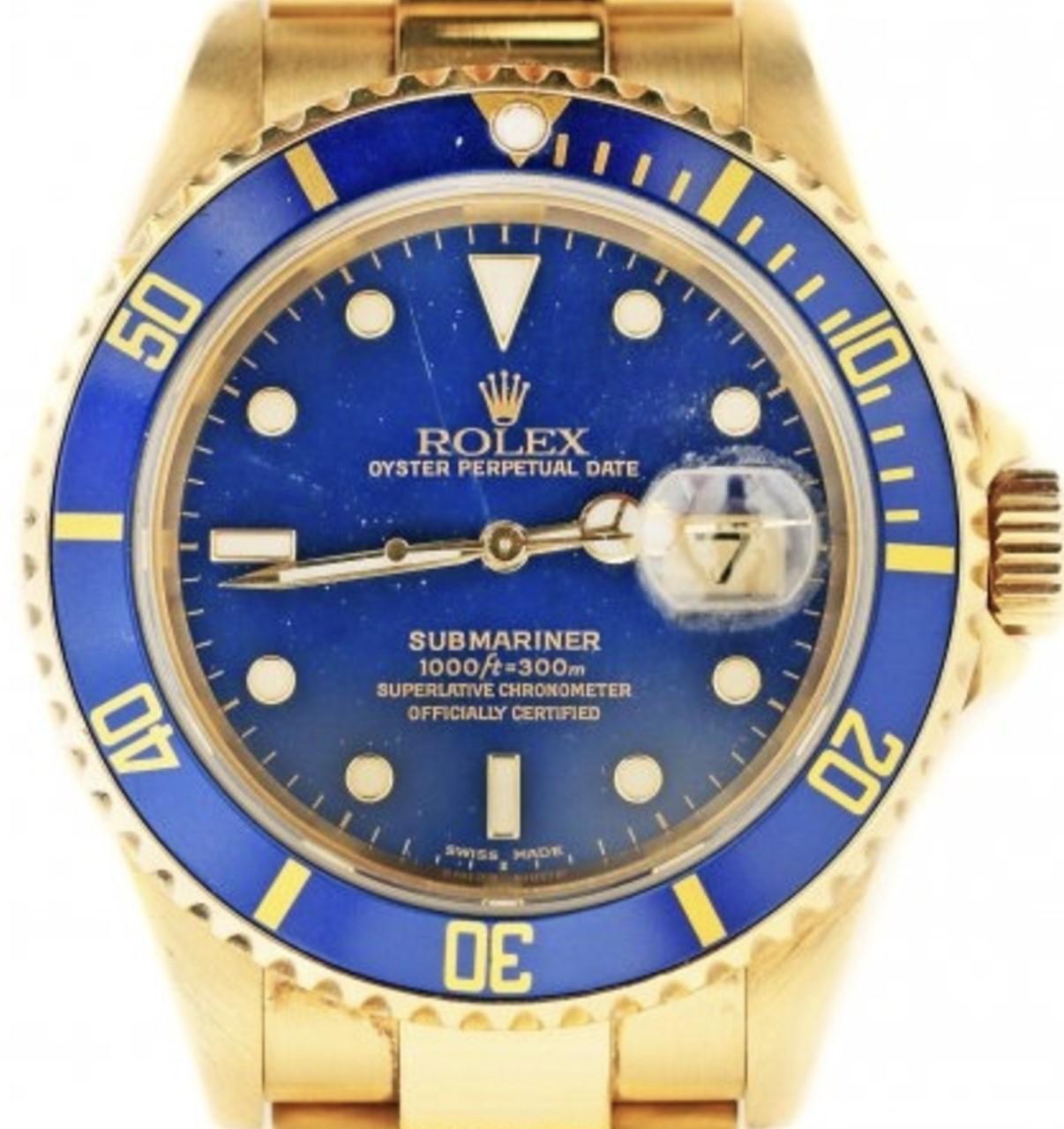 18 Karat Rolex Oyster Perpetual Submariner Wristwatch, Blue Dial In Good Condition In Palm Beach, FL