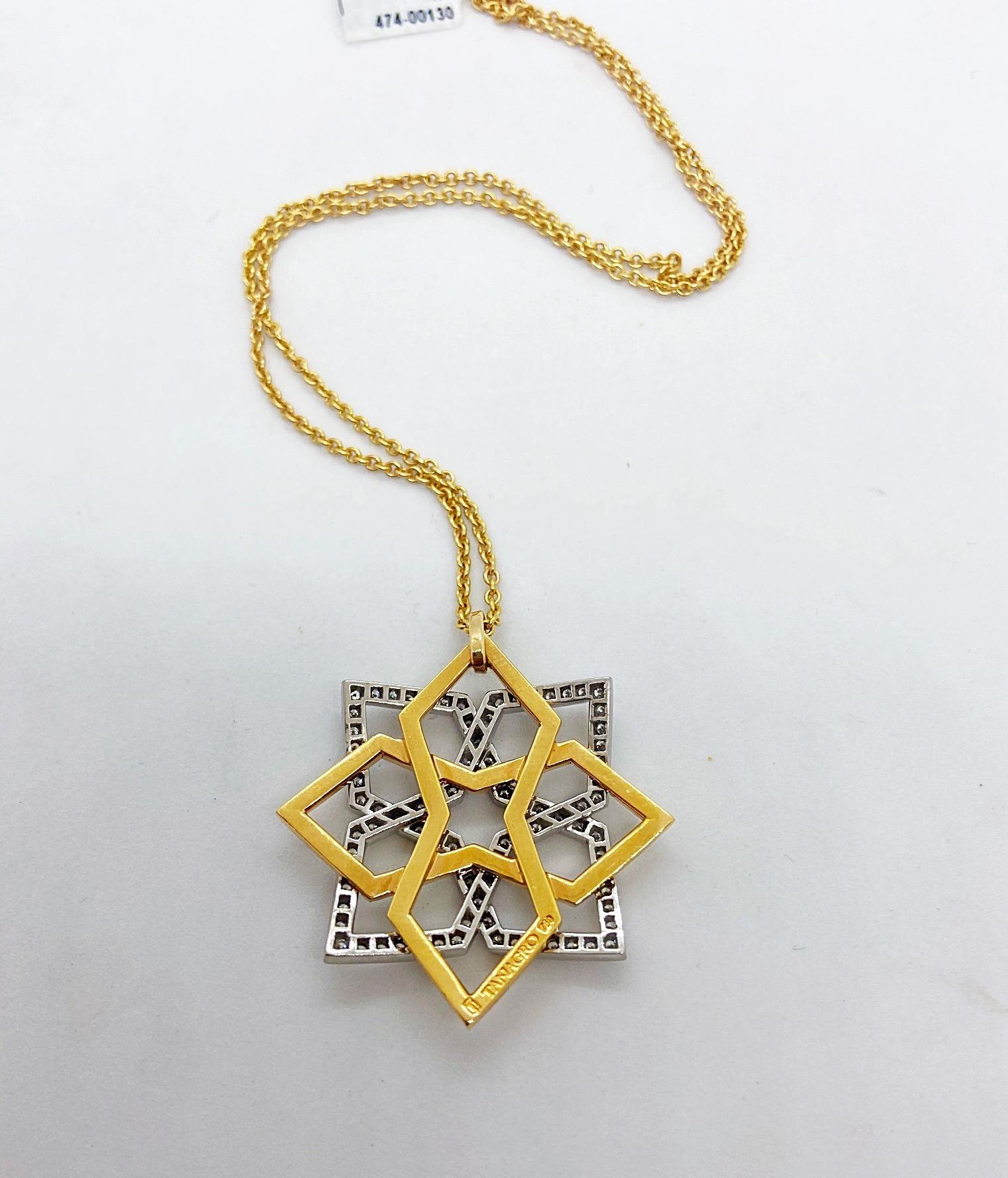 This edgy pendant is a geometric design in a shiny 18 karat rose gold layered with a white gold section set with a single row of round brilliant diamonds. The 1.5