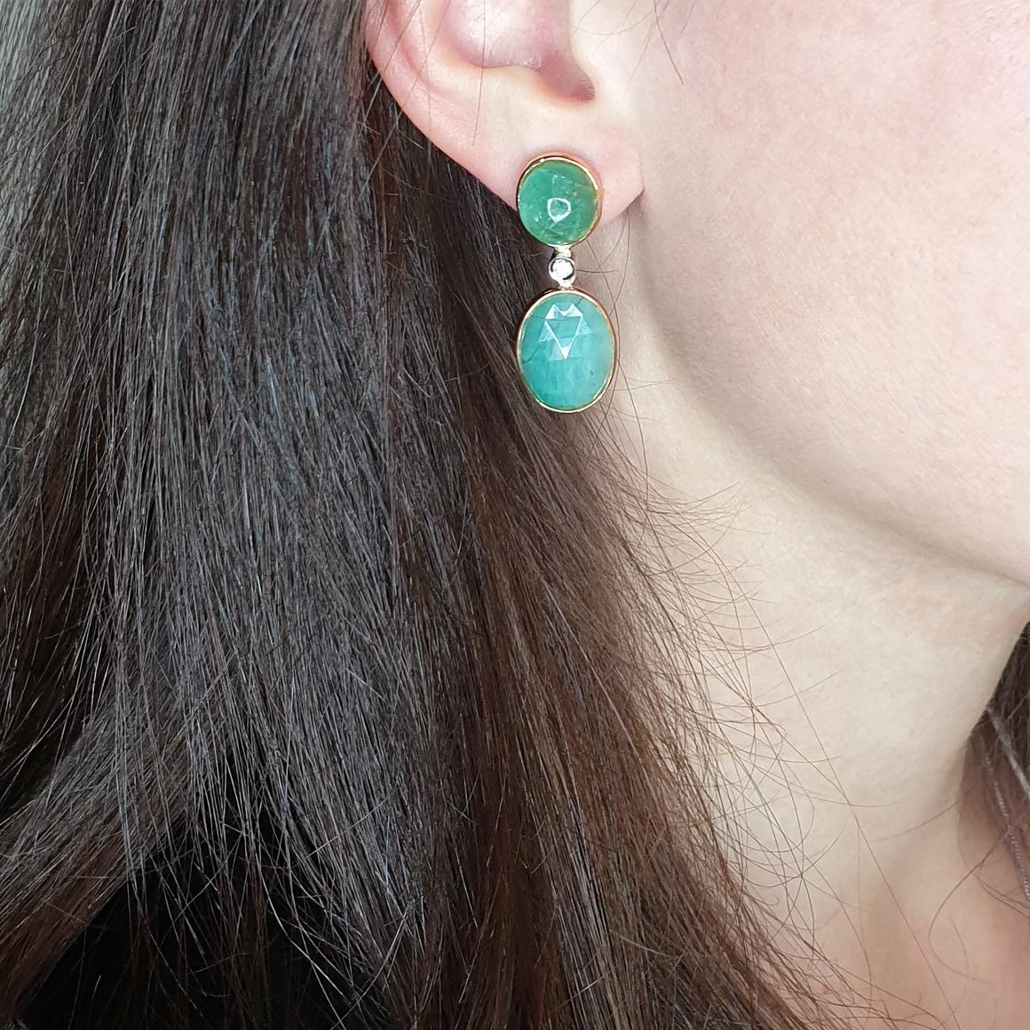 
Shiny and light Emeralds , design and craftmanship handmade in Italy by Stanoppi Jewellery since 1948.
Earrings in 18k rose and white gold with emerald  (oval cabochon cut, size: 10x11mm) and   ( emerald root : 12x16mm) and white Diamonds cts 0,06