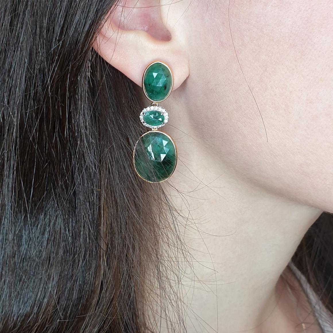 
Shiny  Emeralds , design and craftmanship handmade in Italy by Stanoppi Jewellery since 1948.
Earrings in 18k rose and white gold with emerald  (oval cabochon cut, size: 5x7mm) and   ( emerald root : 14x18mm and 9x12mm) and white Diamonds cts 0,18