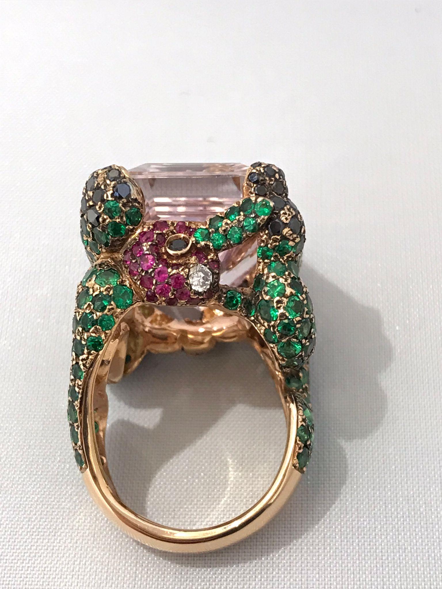 Bruco Mela statement ring, handmade with 18kt rose gold (22,50gr), center kunzite stone (28,23 carat), tzavorrite 7,32 carat, rubies 0.27 carat and diamonds 1,31 carat