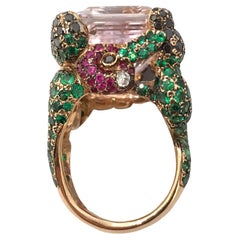 18kt rose gold 22, 5gr, center kunzite stone 28.2ct, tzavorrite 7, 32ct ring