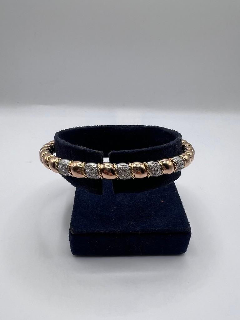 Introducing an exquisite bracelet that epitomizes elegance and luxury. This stunning piece features 45 round diamonds, meticulously set to create a radiant sparkle that captivates the eye. With a total weight of 1 carat, these diamonds are