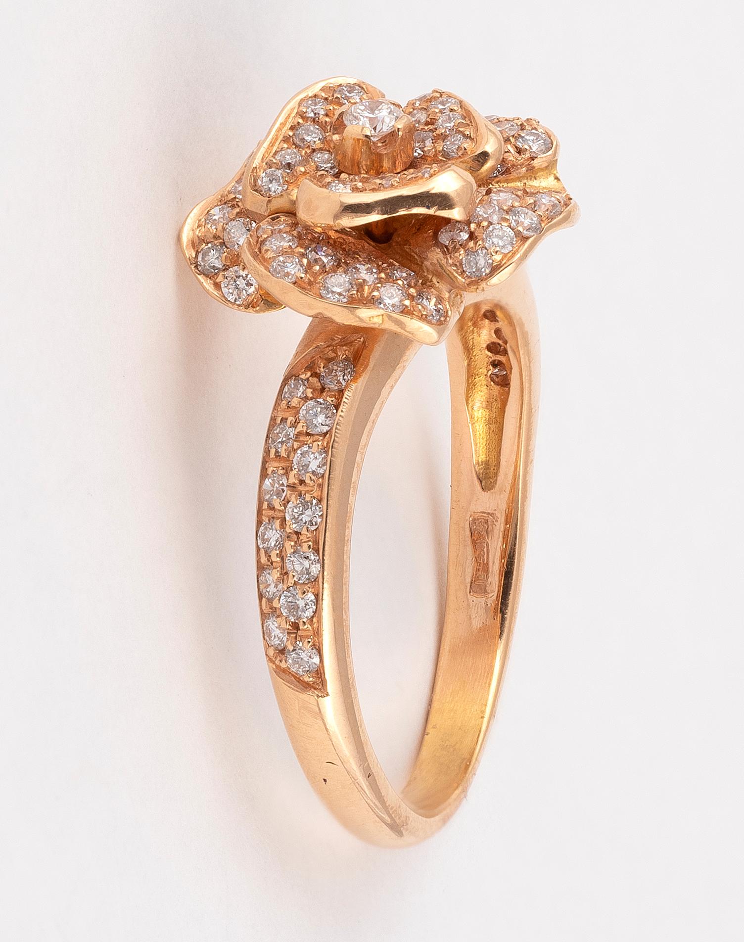 

Designed as a flower with diamond mounted in rose gold.
Weight : 6,2gr.
Size: 7