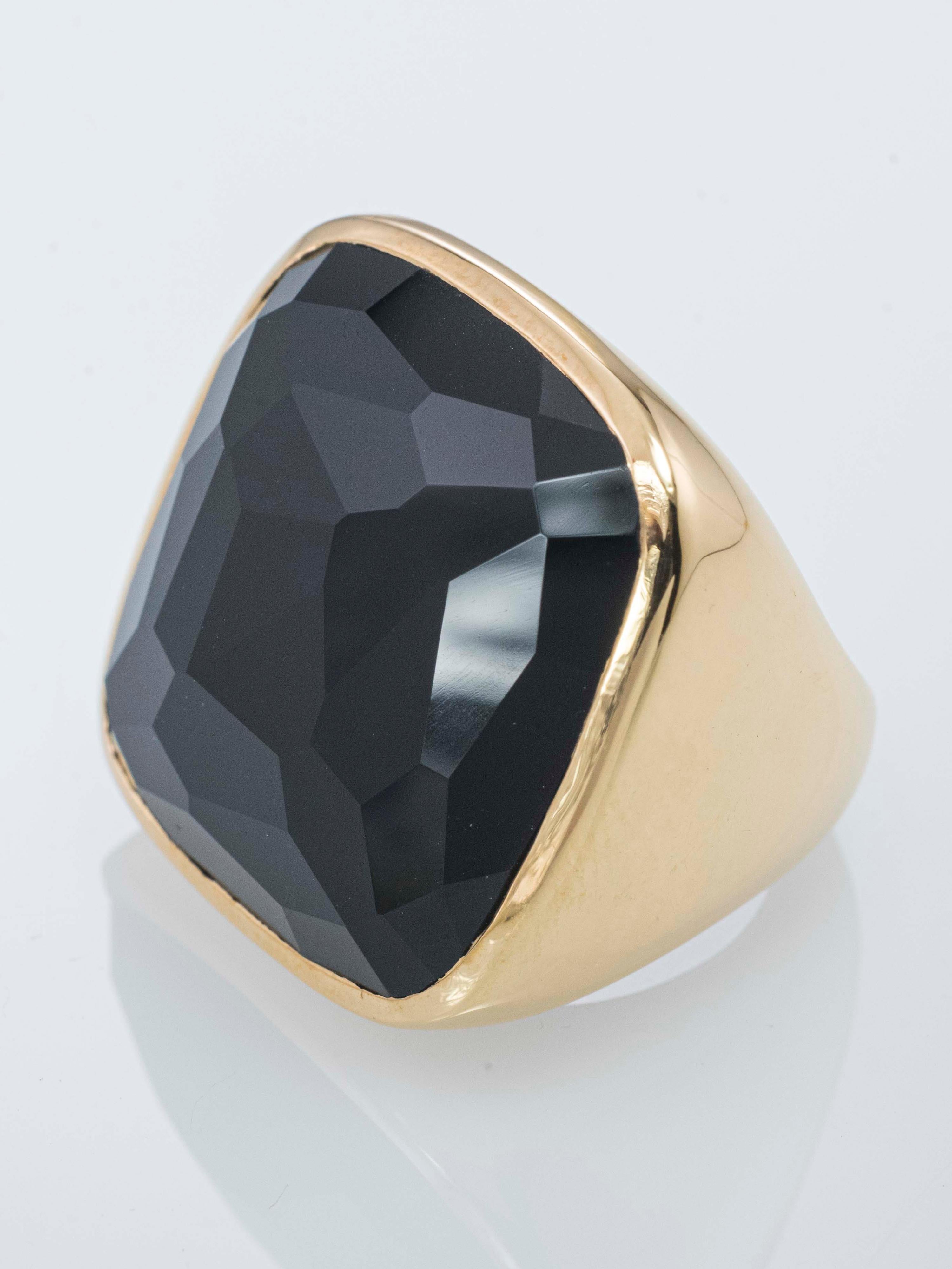 18 Kt rose gold cocktail ring with a geometric shape .
It's ergonomic design makes it very easy and comfortable to wear despite of it's big dimension.
The central Onyx measures cm 2.50x2.50 and weighs ct 27.38.
18 Kt gold weigh gr. 26.20

Made in