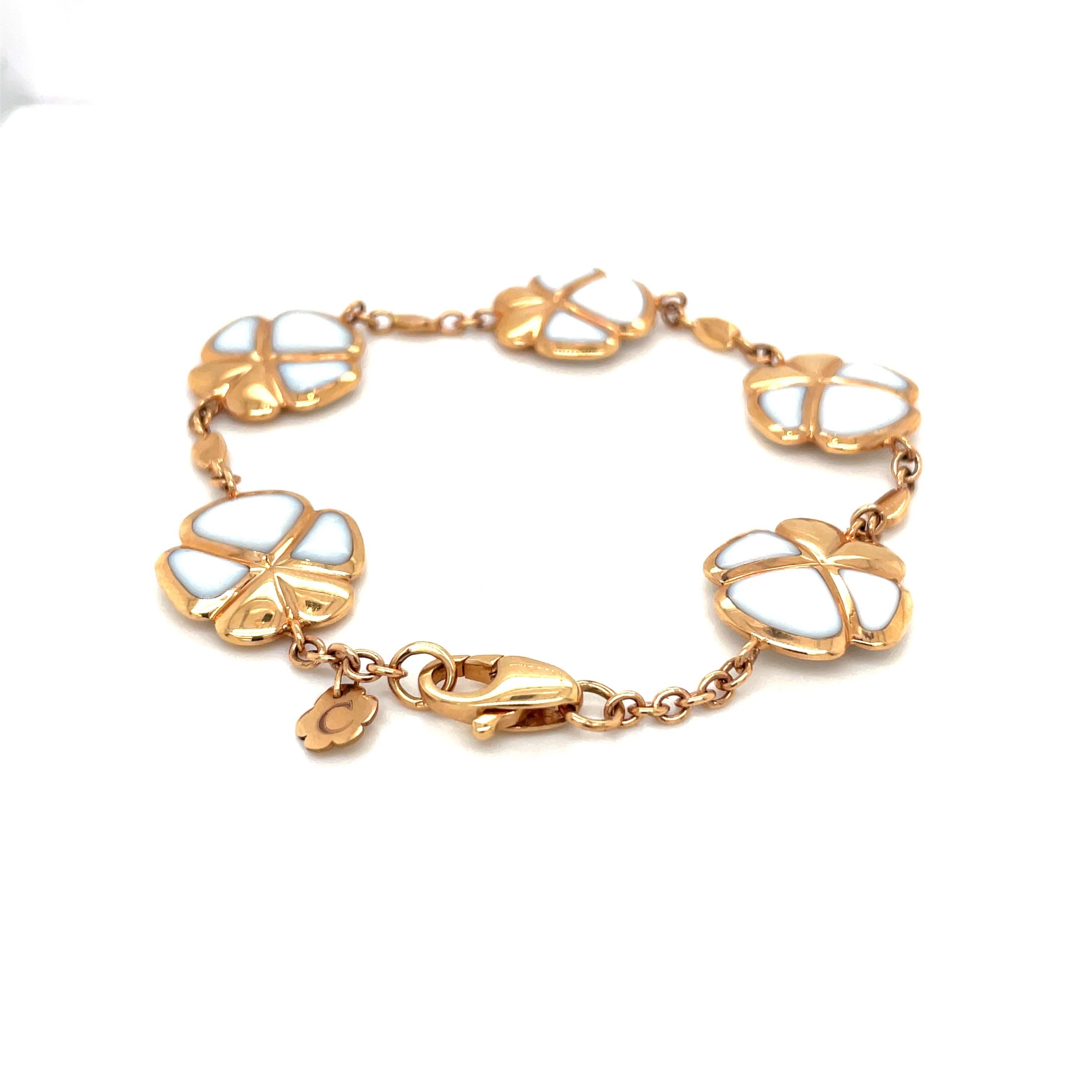 Created by famed Italian Jewelers, De AMBROSI, exclusively for Cellini Jewelers this flower bracelet is inlaid with white kogolong. As a show of the excellent craftsmanship the flowers are completely reversible, with the inlaid kogolong on both the