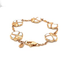 Bracciale con fiori di kogolong bianco e oro rosa 18 carati