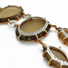 18kt Rose Gold Bracelet with 1, 60 ct Diamonds and 10 ct Cognac Quartz