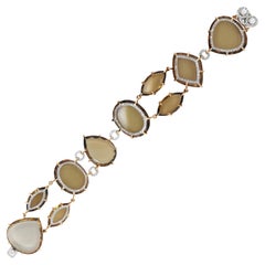 Bracelet en or rose 18 carats avec 1, 60 carat de diamants et 10 carats de quartz cognac