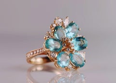 Alluring 18kt Rose Gold Cocktail Ring with Oval Blue Apatites and Diamonds