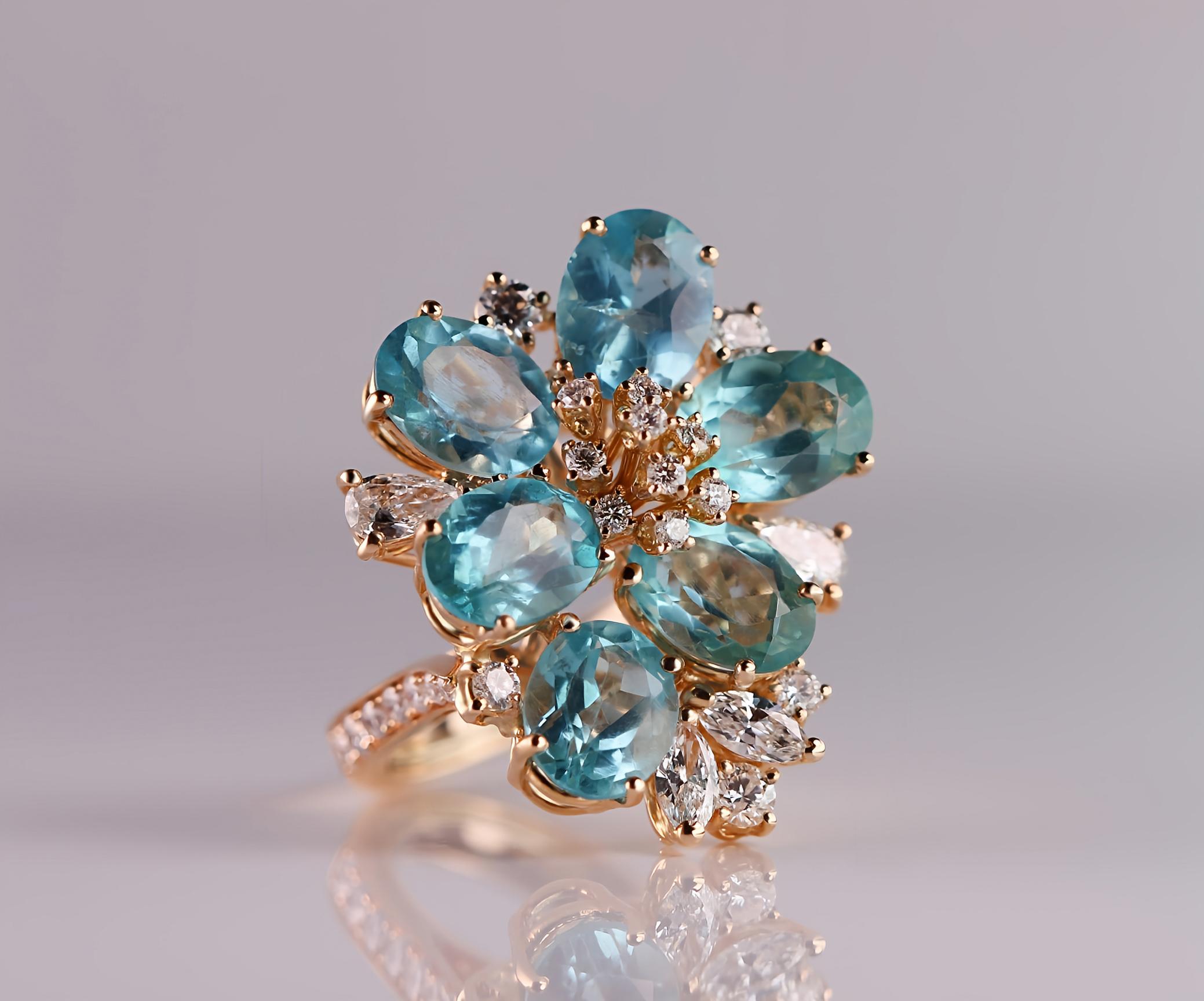 Contemporary Alluring 18kt Rose Gold Cocktail Ring with Oval Blue Apatites and Diamonds For Sale