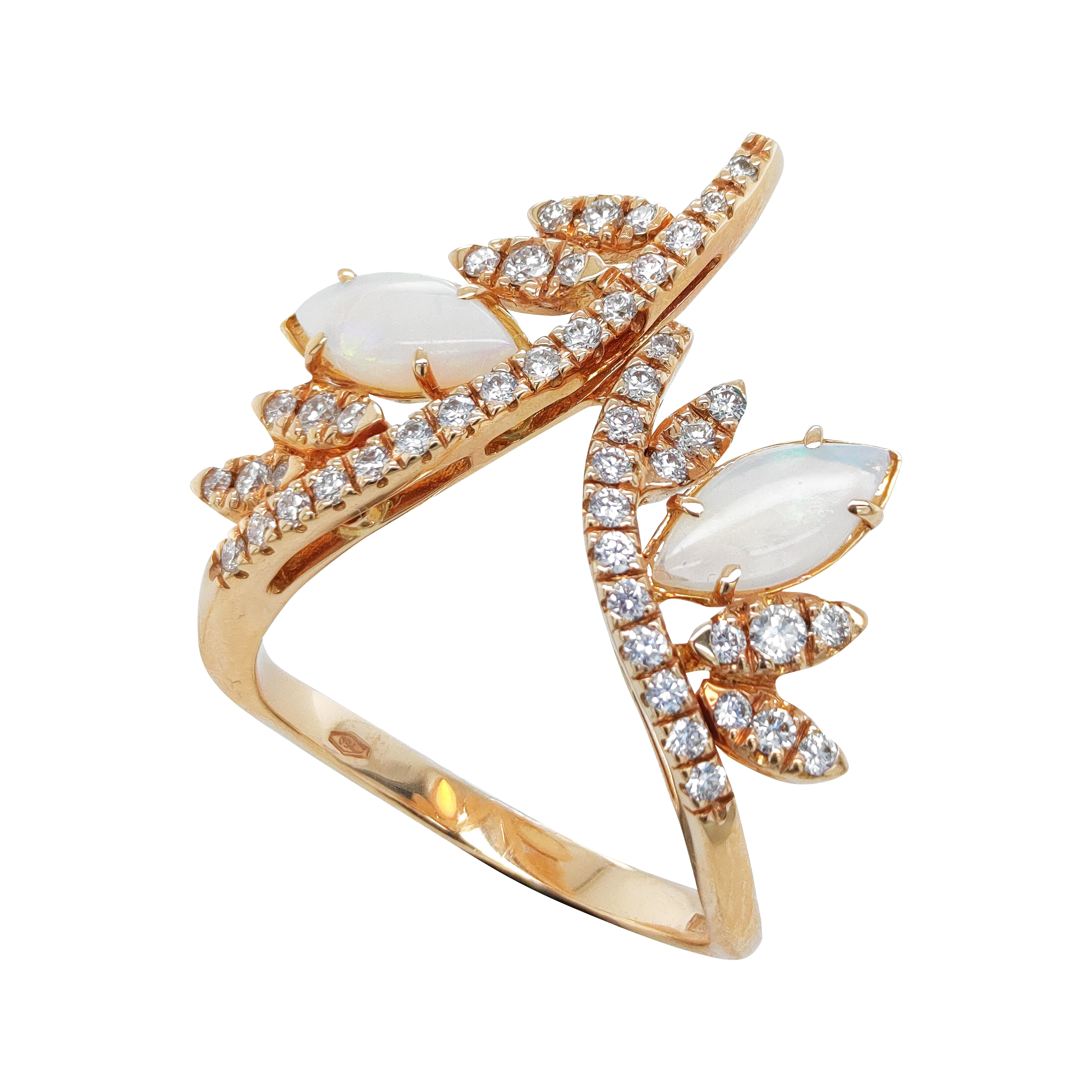 Bague mode en or rose 18 carats avec opales taillées en marquise et  0, 47 ct de diamants