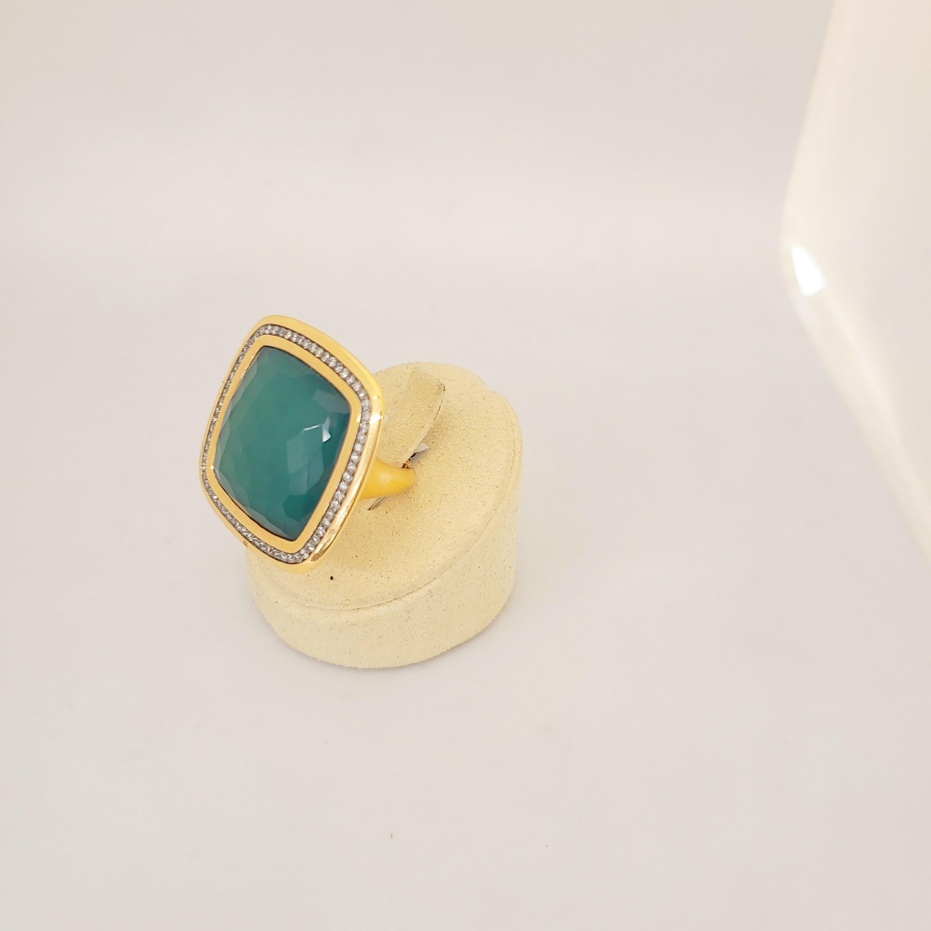 This large cushion shaped square ring is composed of 9.94 ct green agate with a 16.92ct faceted white quartz overlay, The combination of the two stones gives this ring a unique color and brilliance. The rich green is intensified by 18kt rose gold