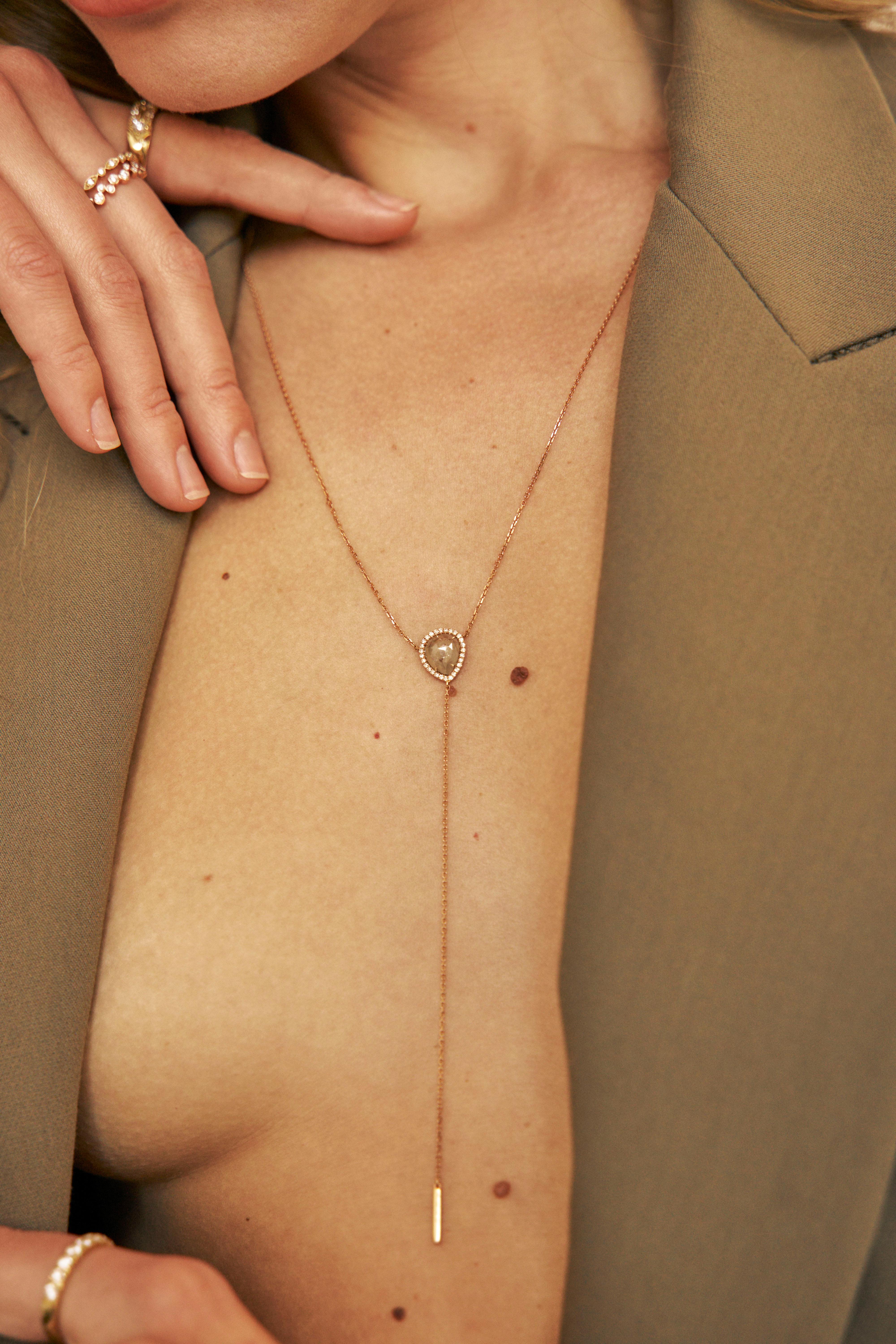 Rough Diamond Lariat is a perfect statement piece for every day. It's made from 18-karat gold with a rough facet diamond. Wear yours solo with a deep-cut shirt for the greatest impact.

18kt Rose Gold
Chain Length: 20” - 22”
Center Stone Weight: