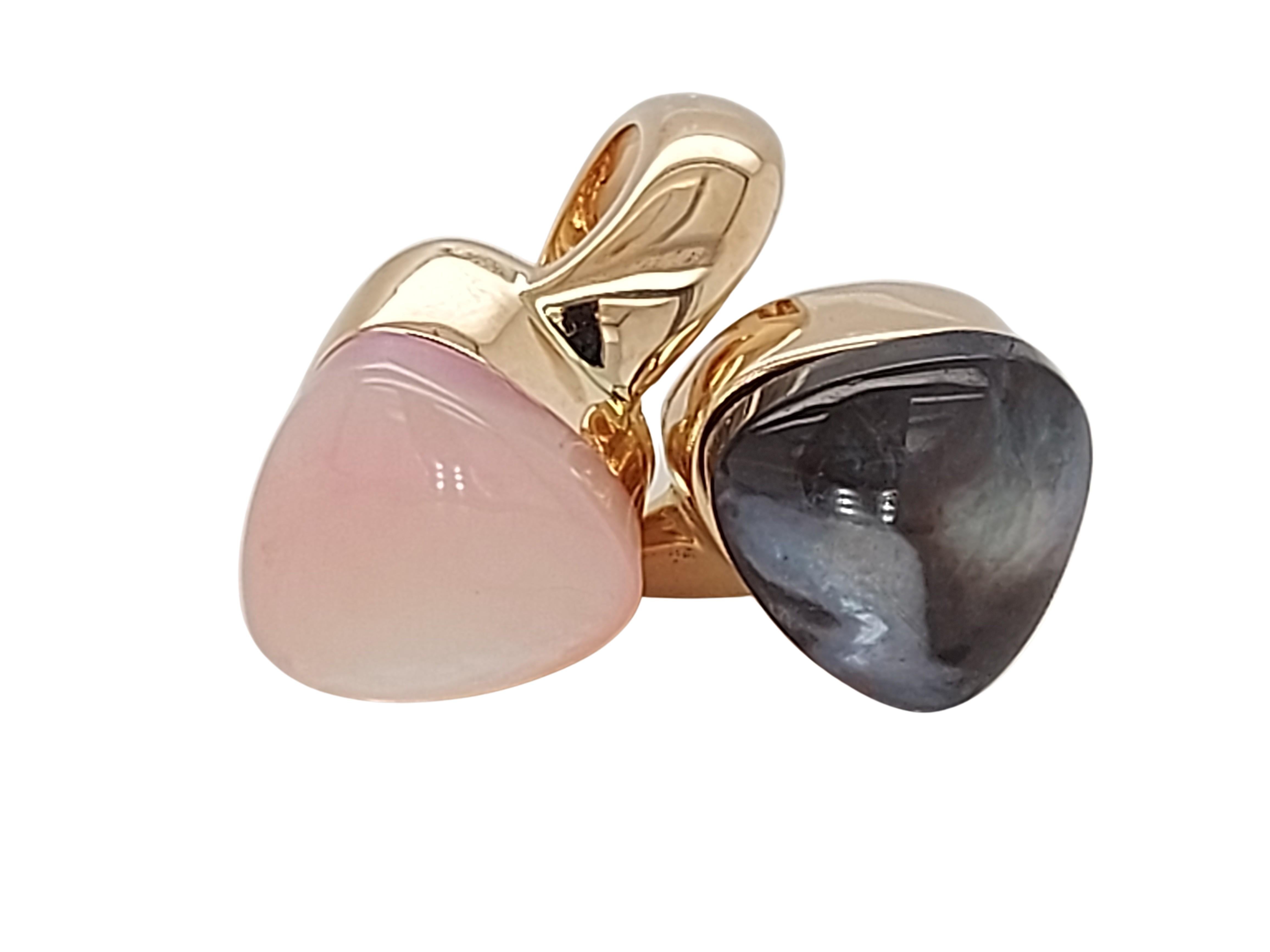 Magnificent 18kt Rose Gold Mattioli Toi et Moi Ring With Mother of Pearl

Stone: Pink and black mother of pearl

Material: 18kt Pink gold

Ring size: 54.4 EU / 7 US ( can be resized for free)

Total weight: 19.2 gram / 0.680 oz / 12.4 dwt